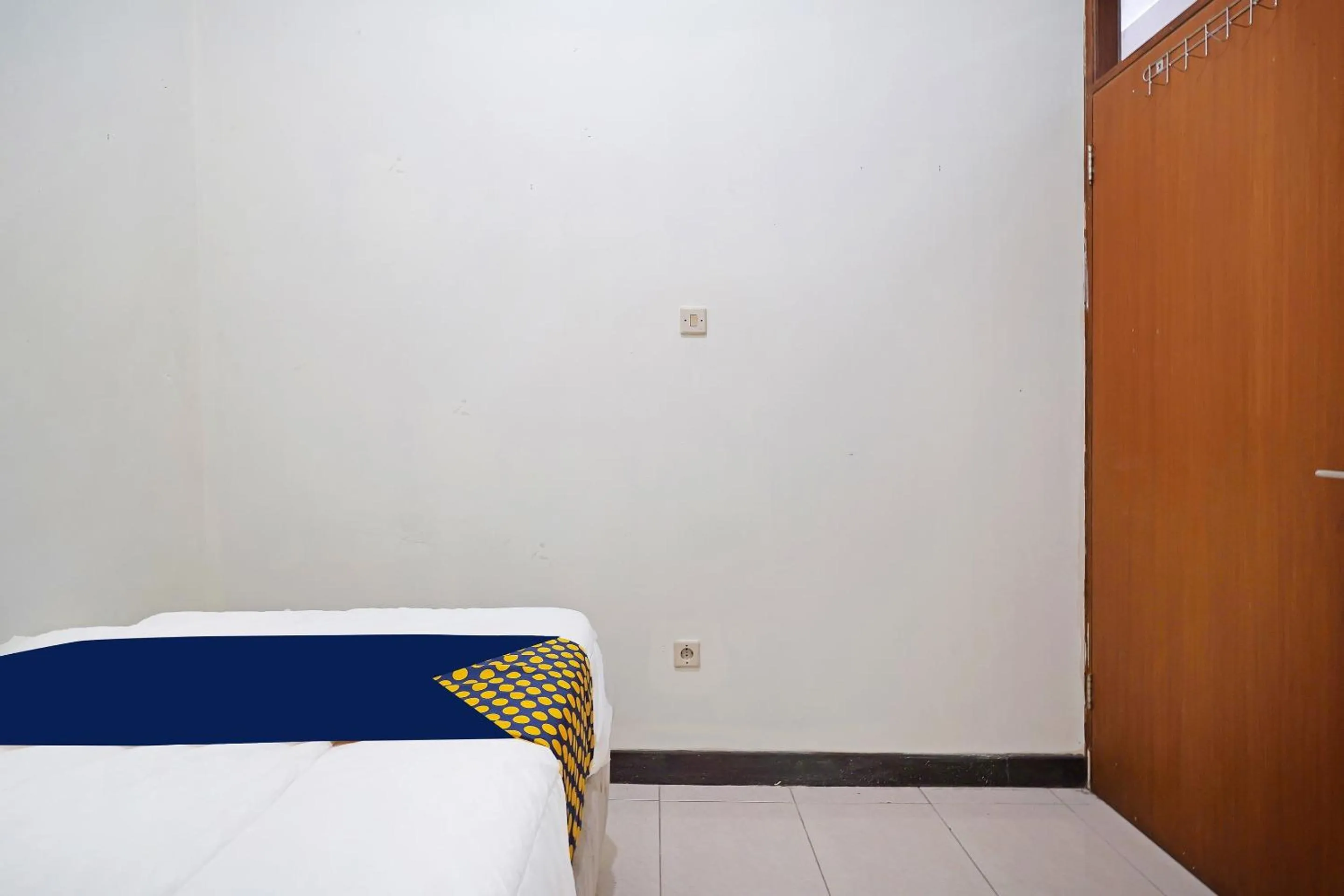 Bedroom in SPOT ON 91394 Pondok Paskal Syariah