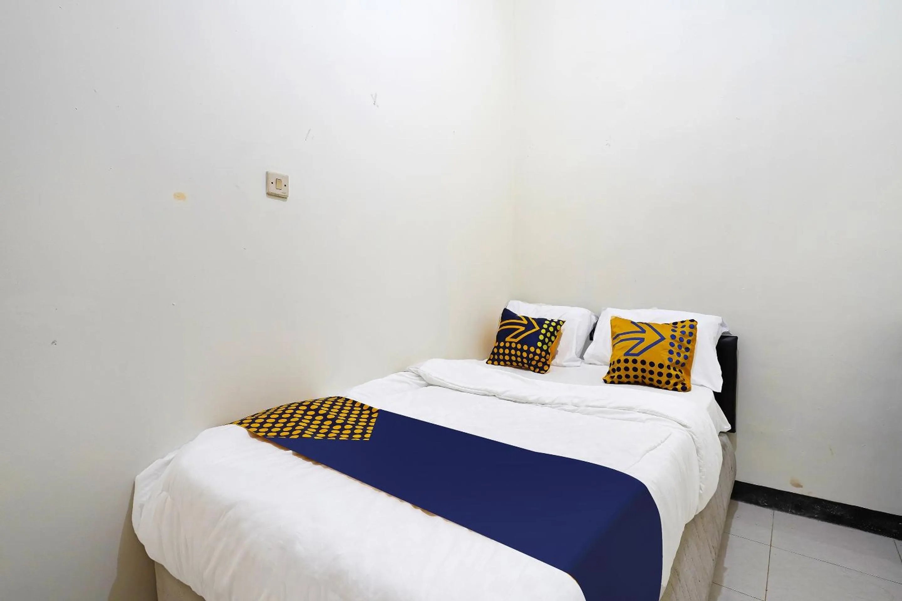 Bedroom in SPOT ON 91394 Pondok Paskal Syariah