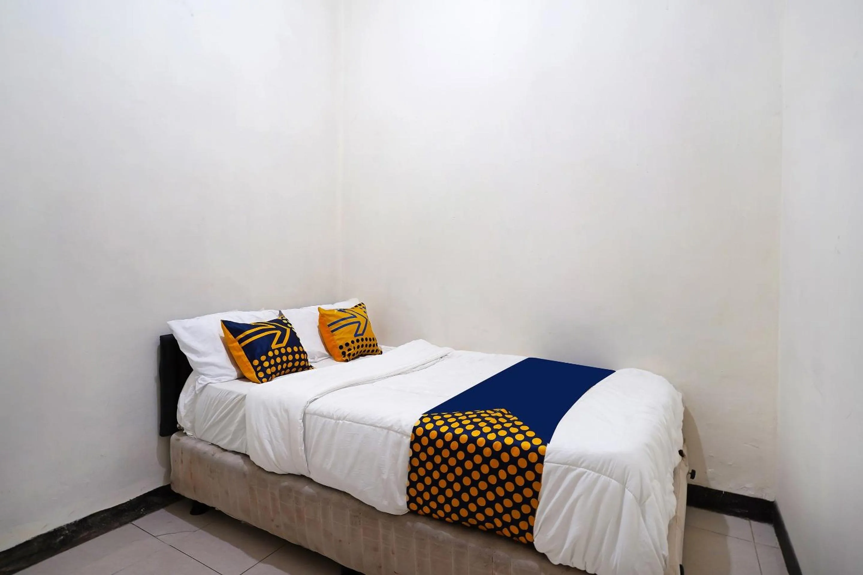 Bedroom in SPOT ON 91394 Pondok Paskal Syariah