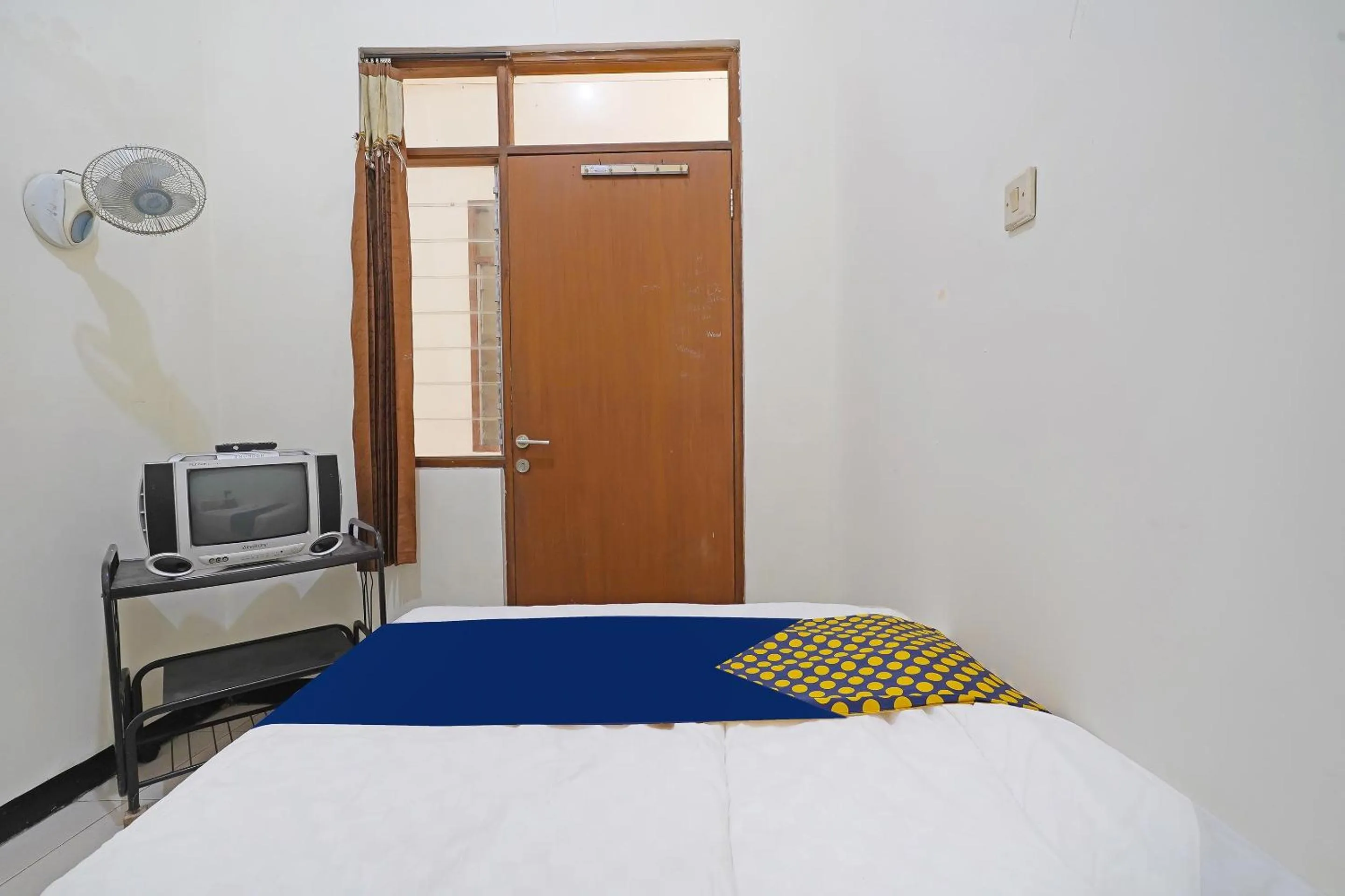 Bedroom in SPOT ON 91394 Pondok Paskal Syariah
