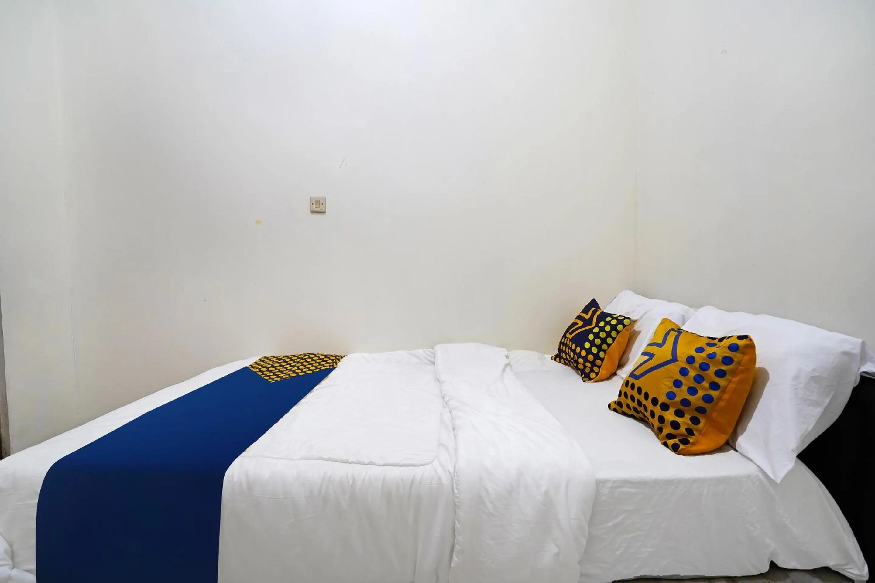 Bedroom in SPOT ON 91394 Pondok Paskal Syariah