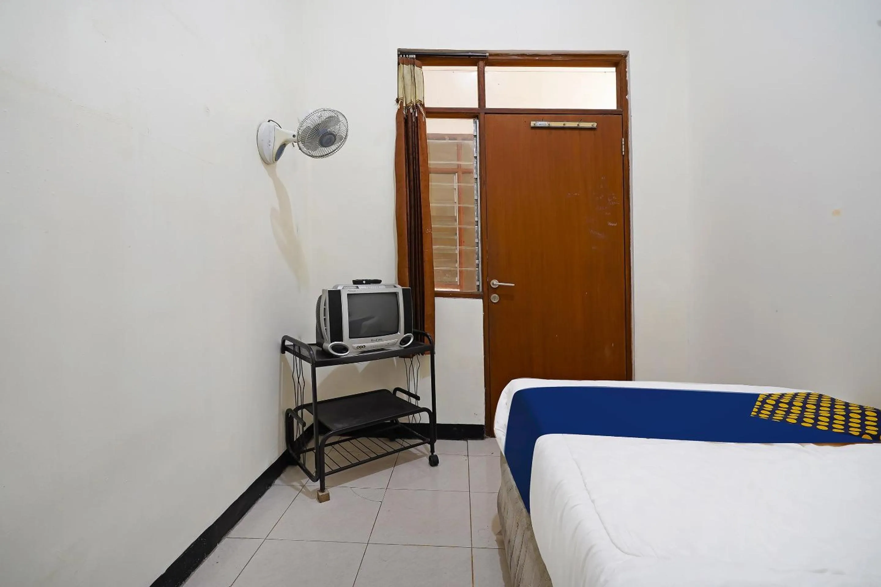 Bedroom in SPOT ON 91394 Pondok Paskal Syariah