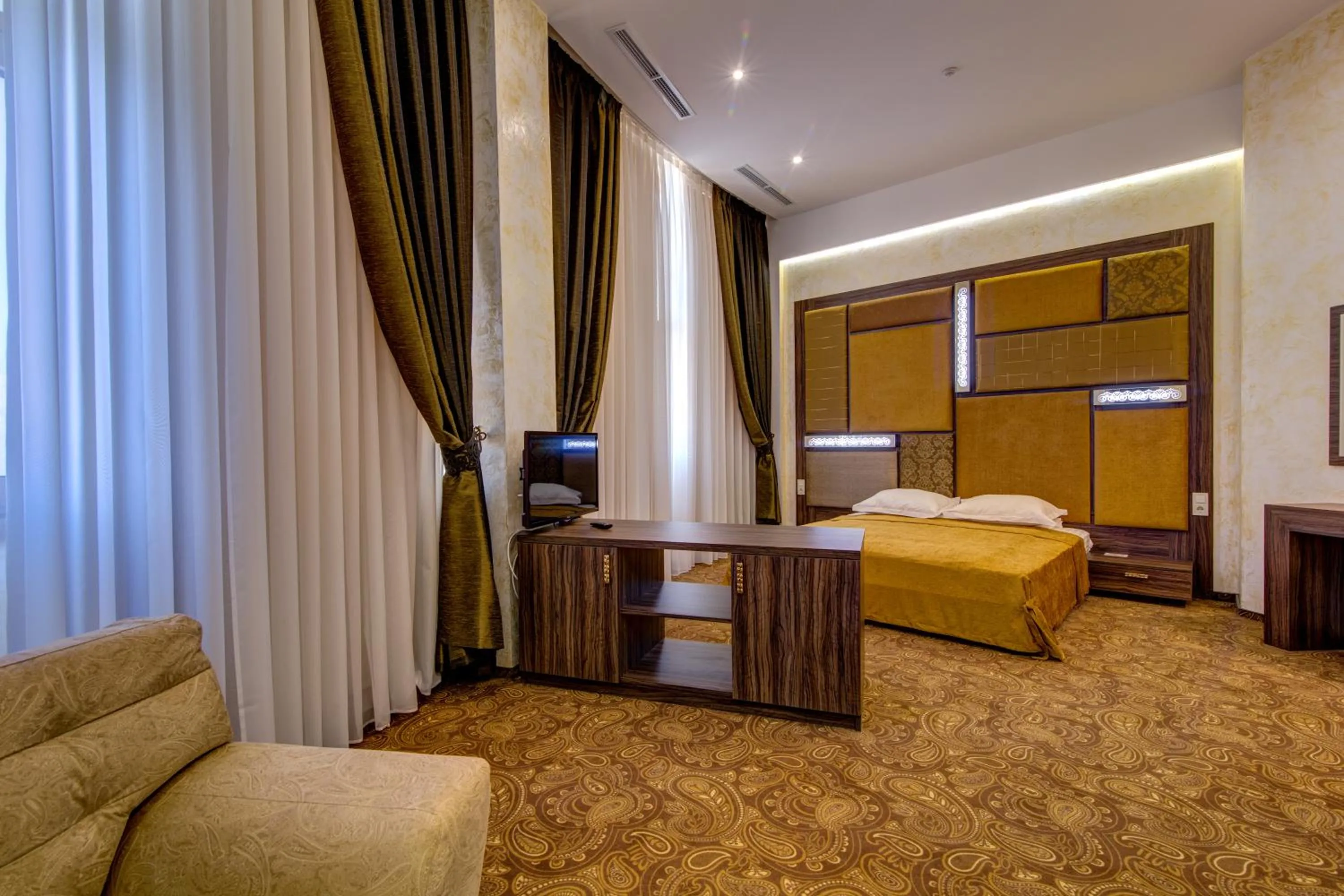 TV and multimedia, Bed in Khan-Chinar Hotel