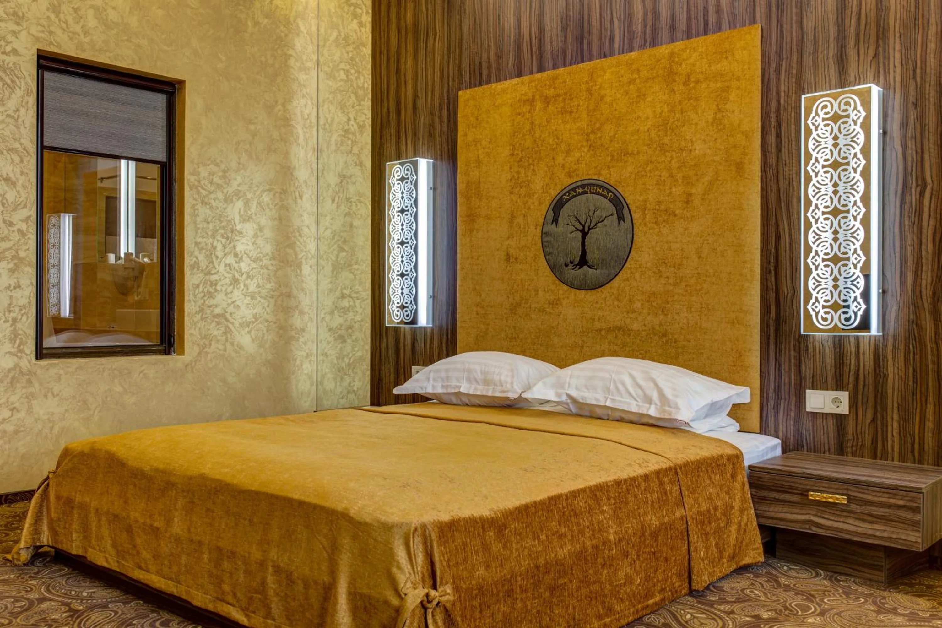 Bed in Khan-Chinar Hotel