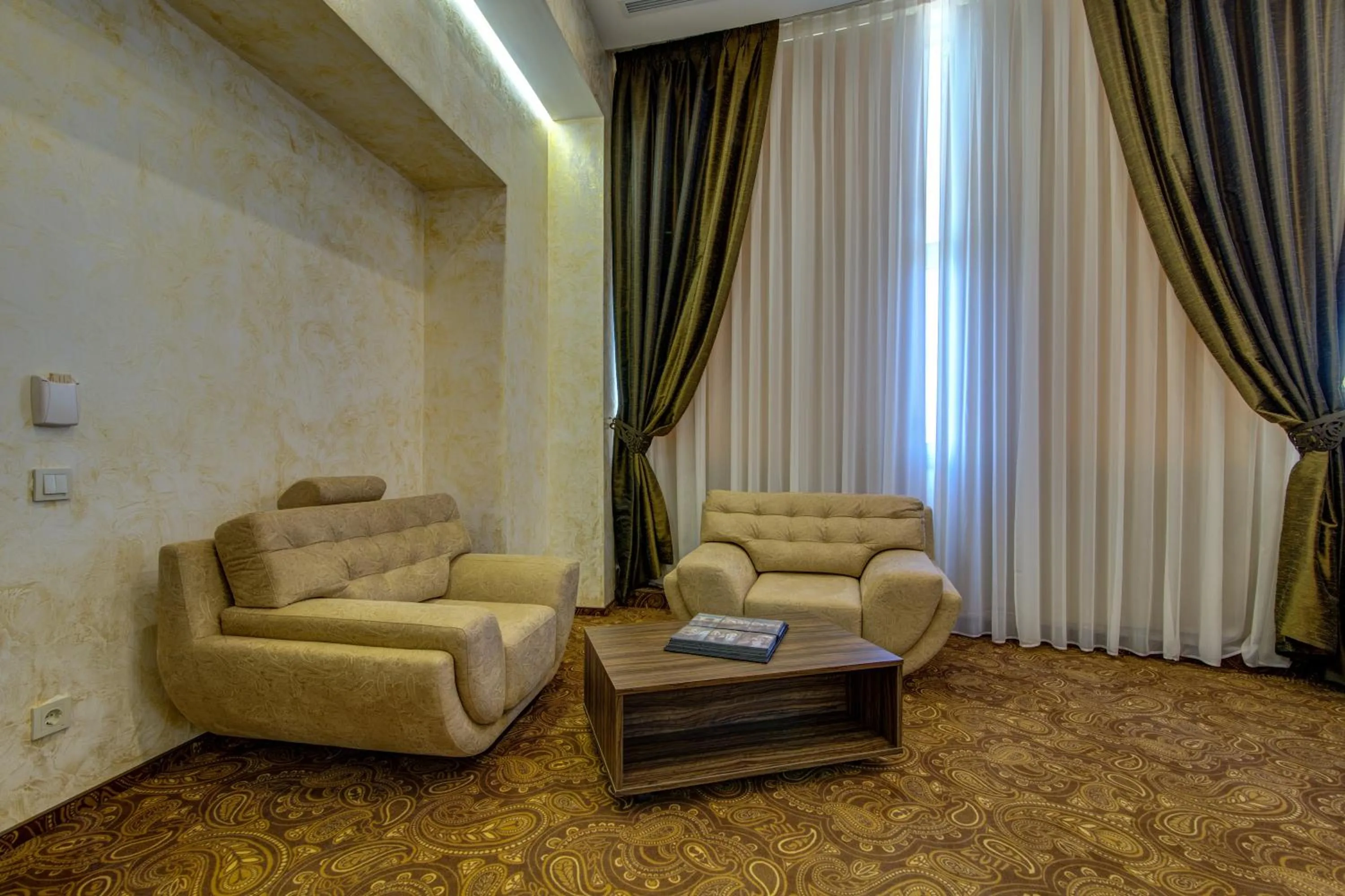 Living room in Khan-Chinar Hotel