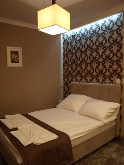 Bed in Hotel Kamiza
