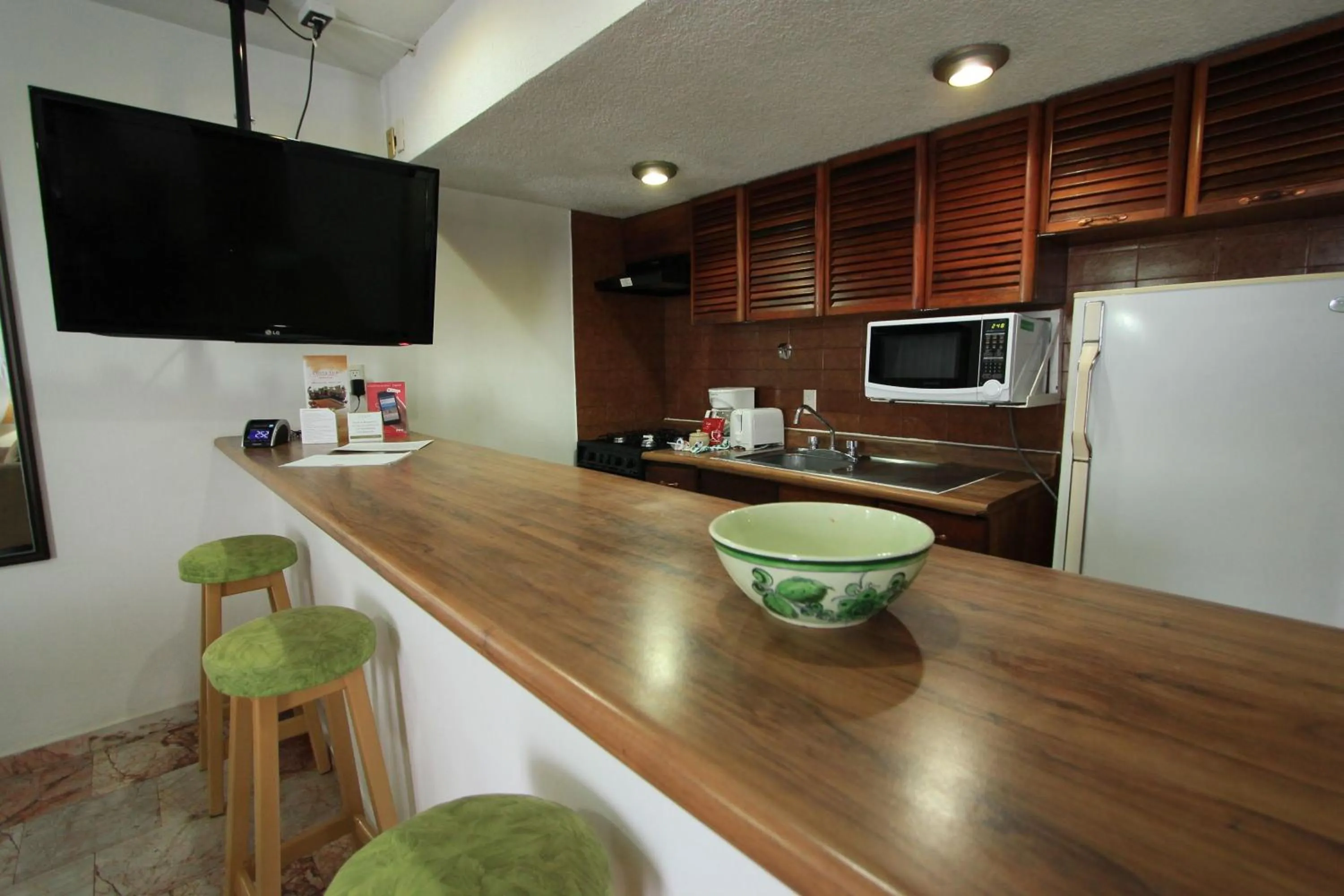 Kitchen or kitchenette in Costa Sur Resort by VRHost