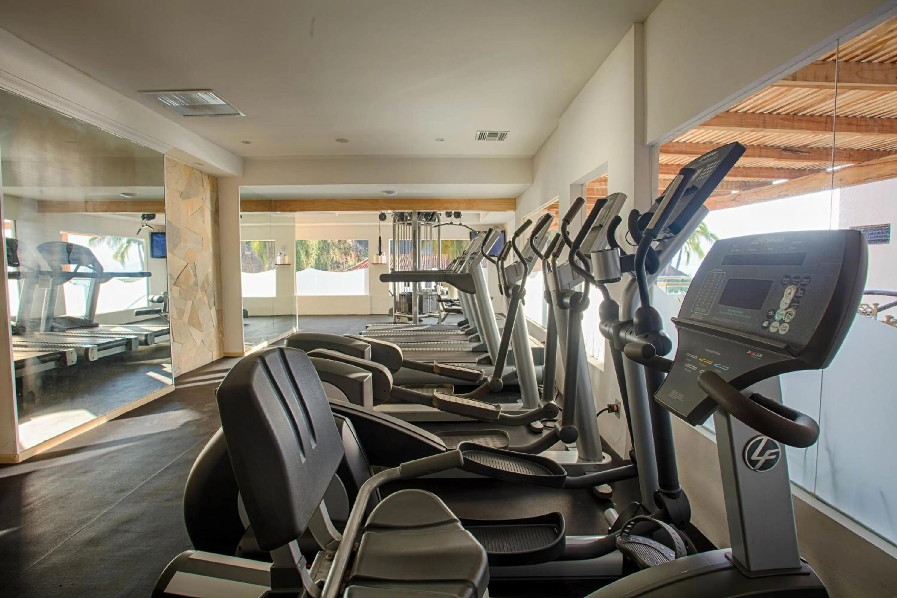 Fitness centre/facilities in Costa Sur Resort by VRHost
