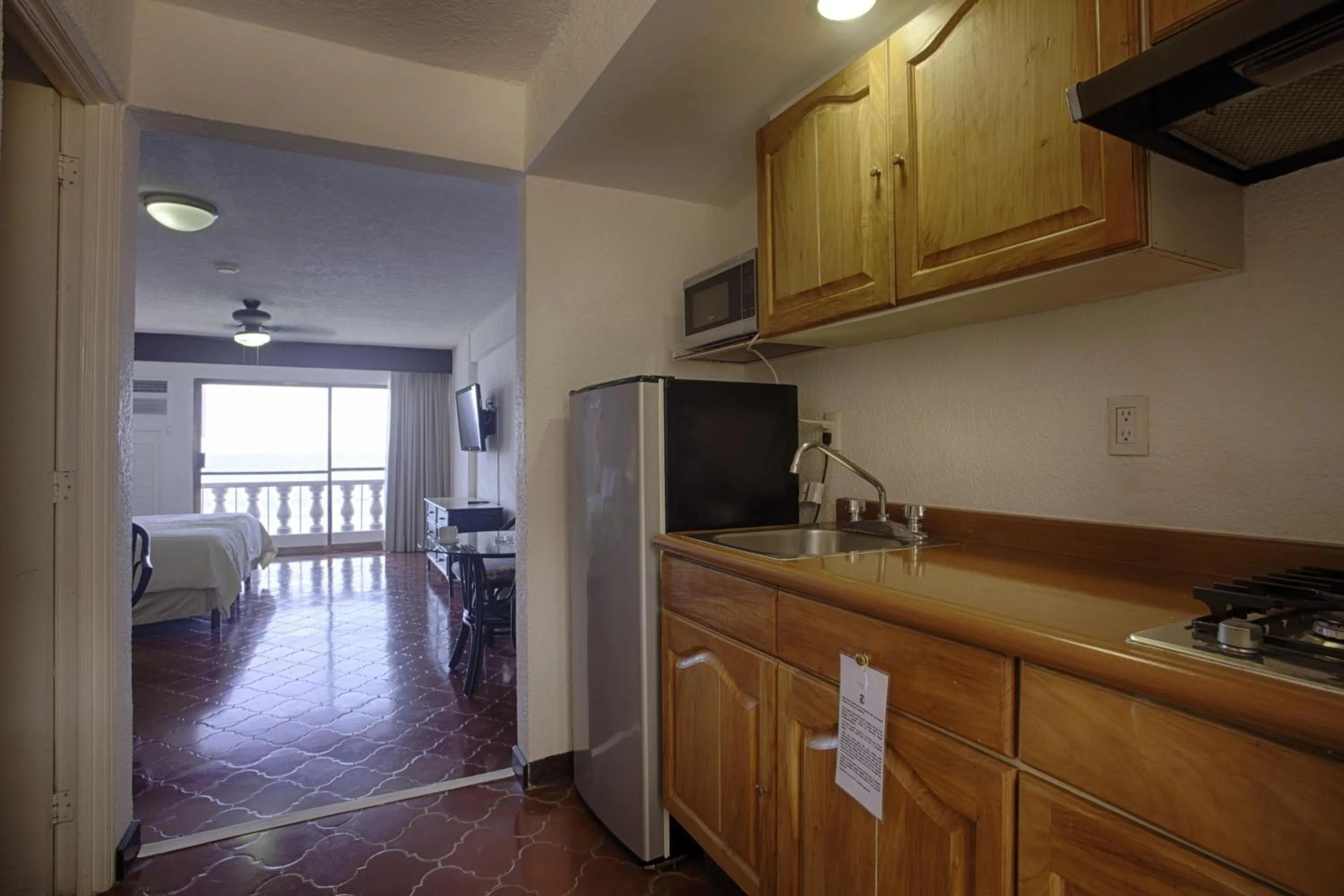 Kitchen or kitchenette in Costa Sur Resort by VRHost