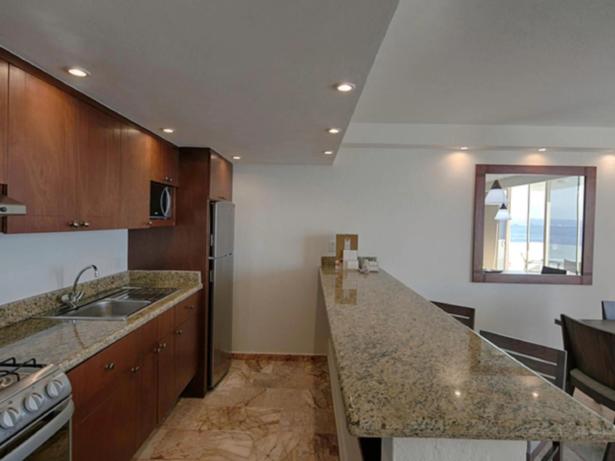 kitchen in Costa Sur Resort by VRHost