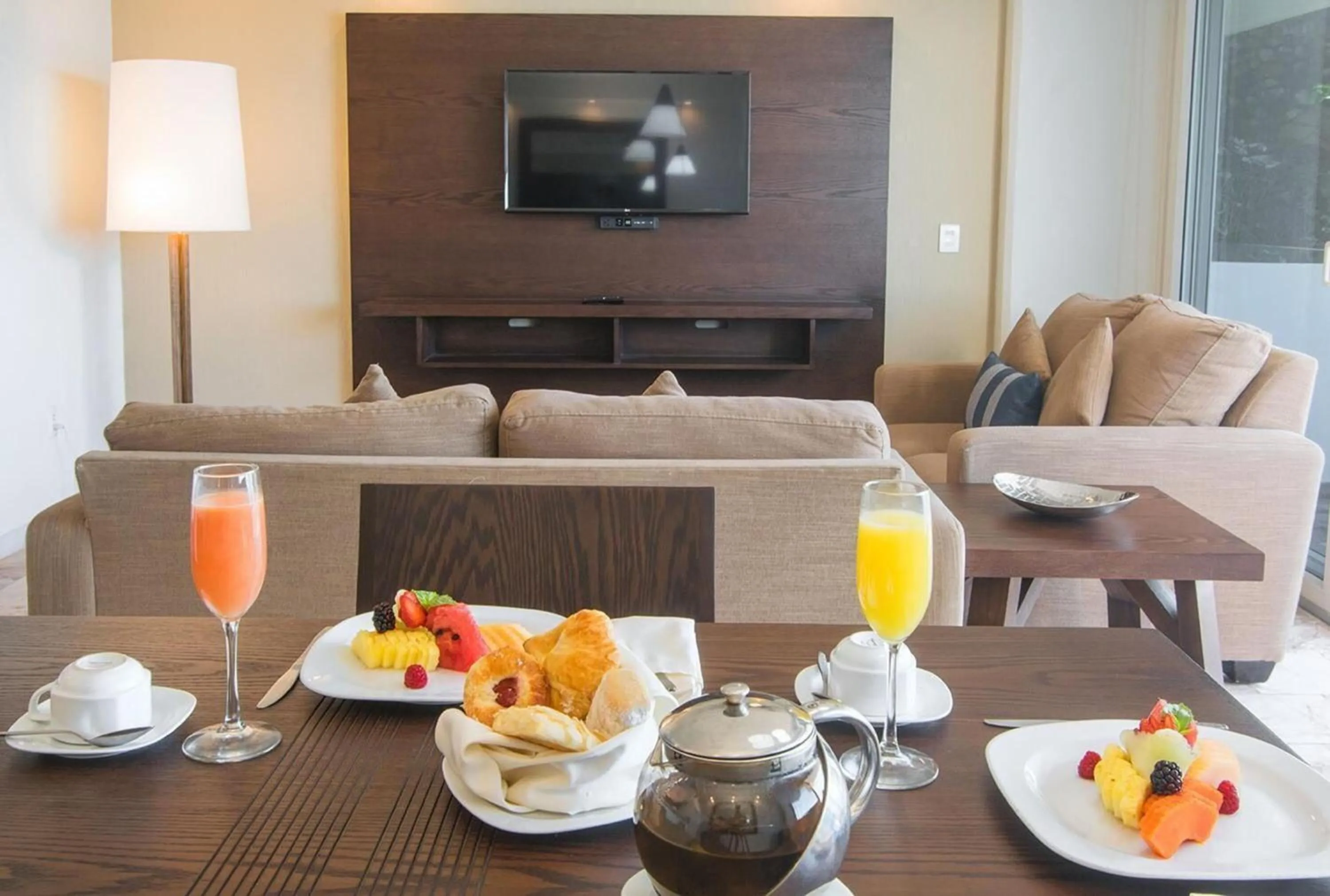 Seating area in Costa Sur Resort by VRHost