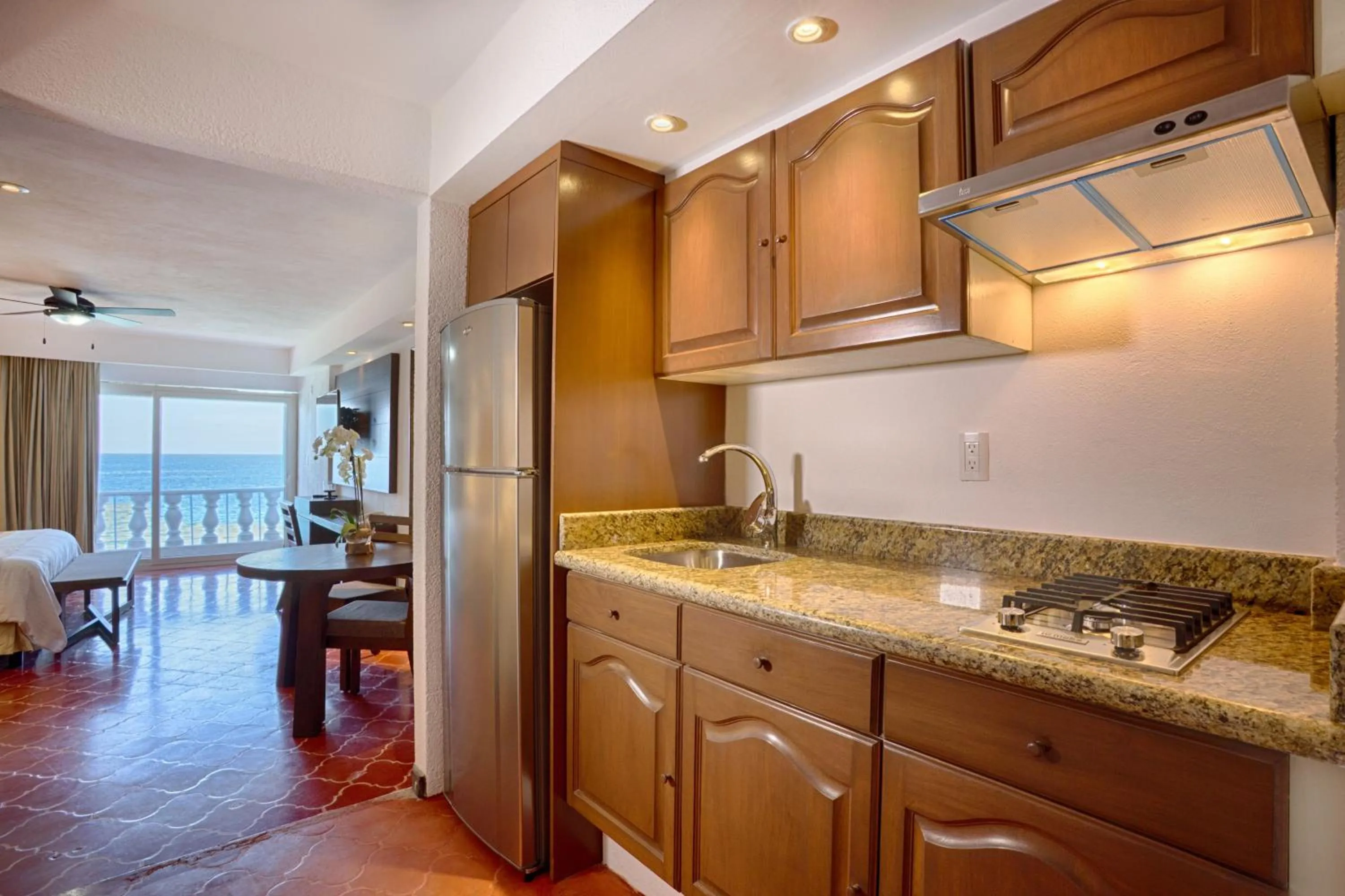 Kitchen or kitchenette in Costa Sur Resort by VRHost