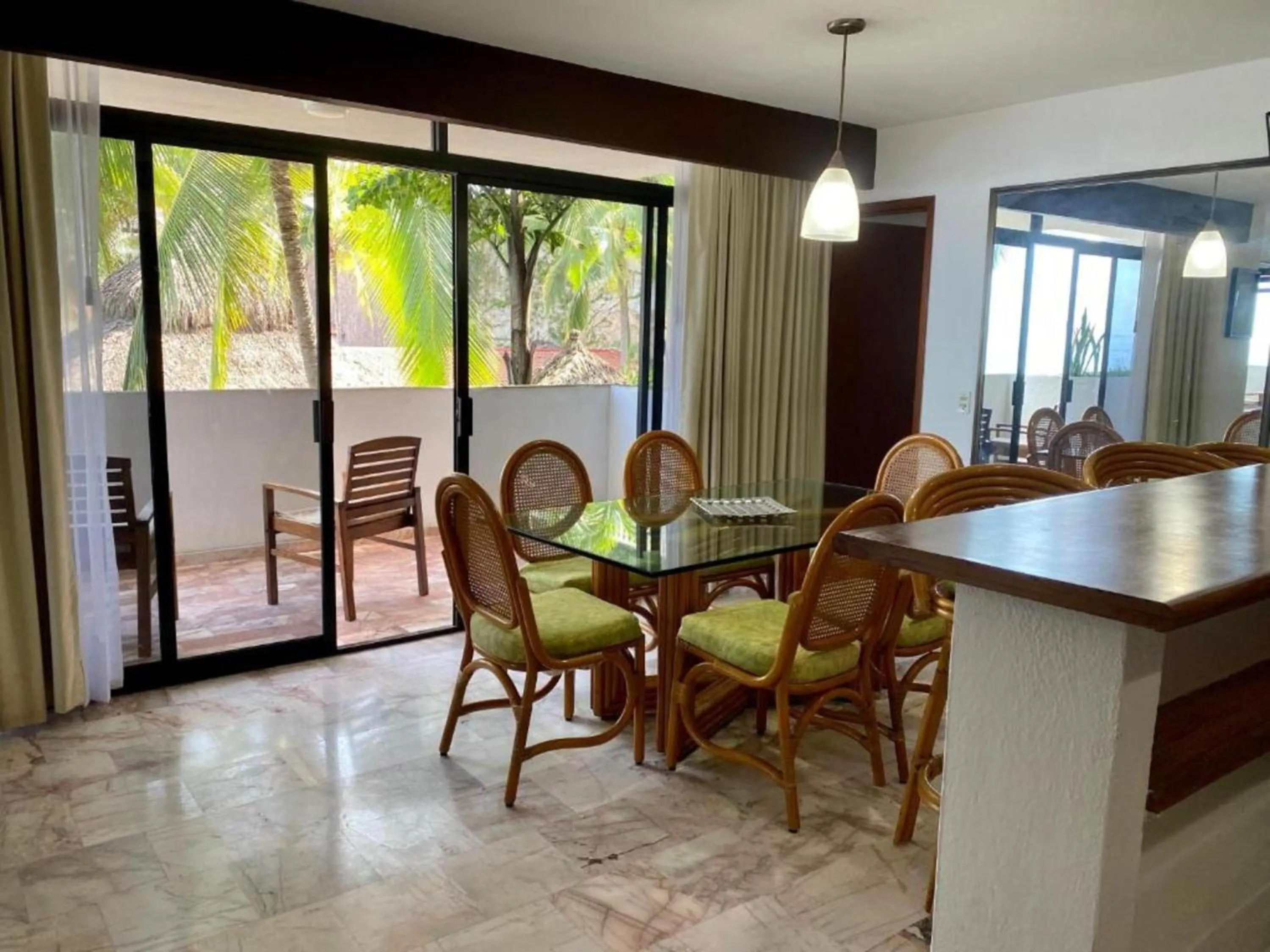 Dining area in Costa Sur Resort by VRHost