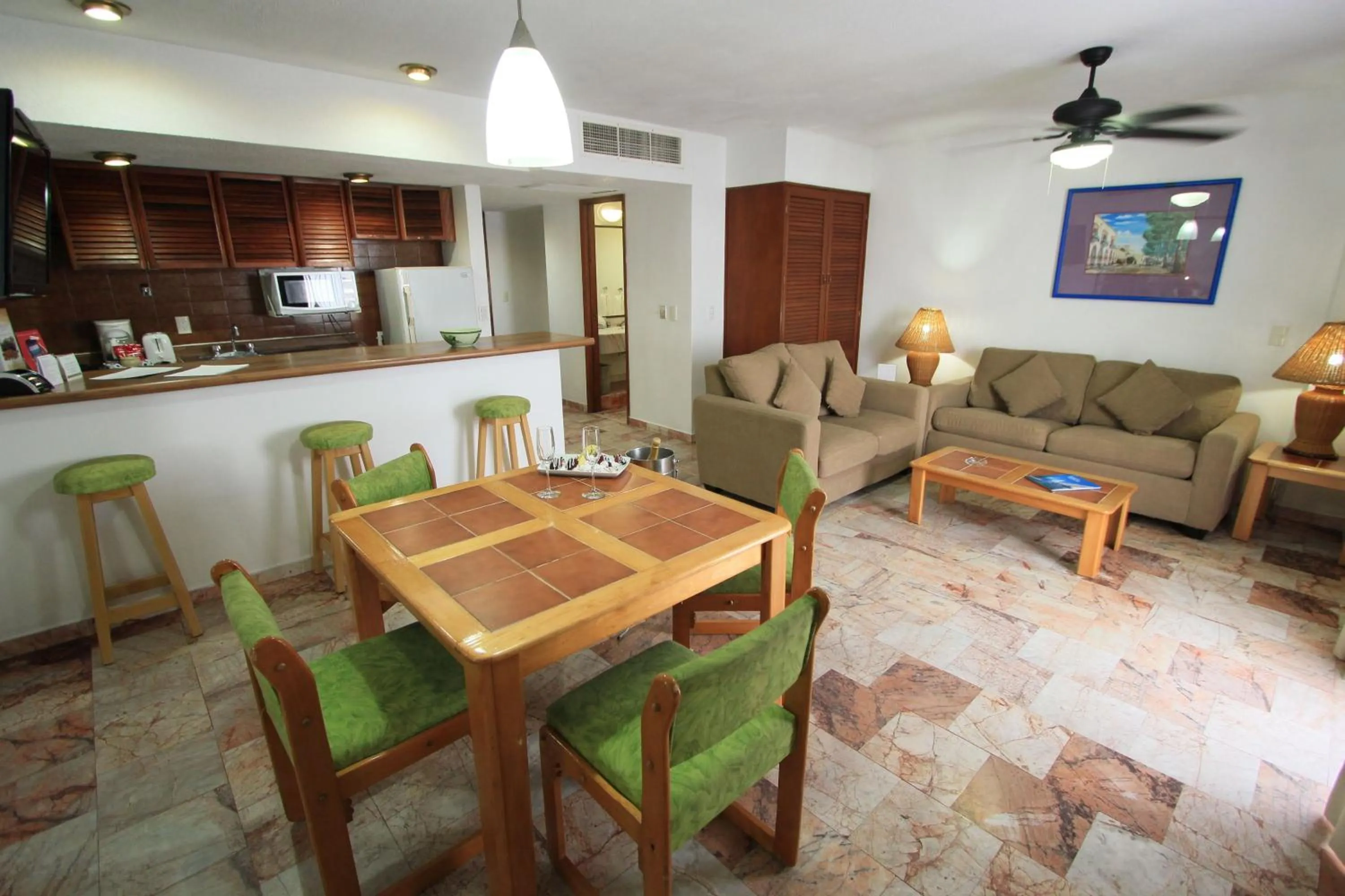 Seating area in Costa Sur Resort by VRHost