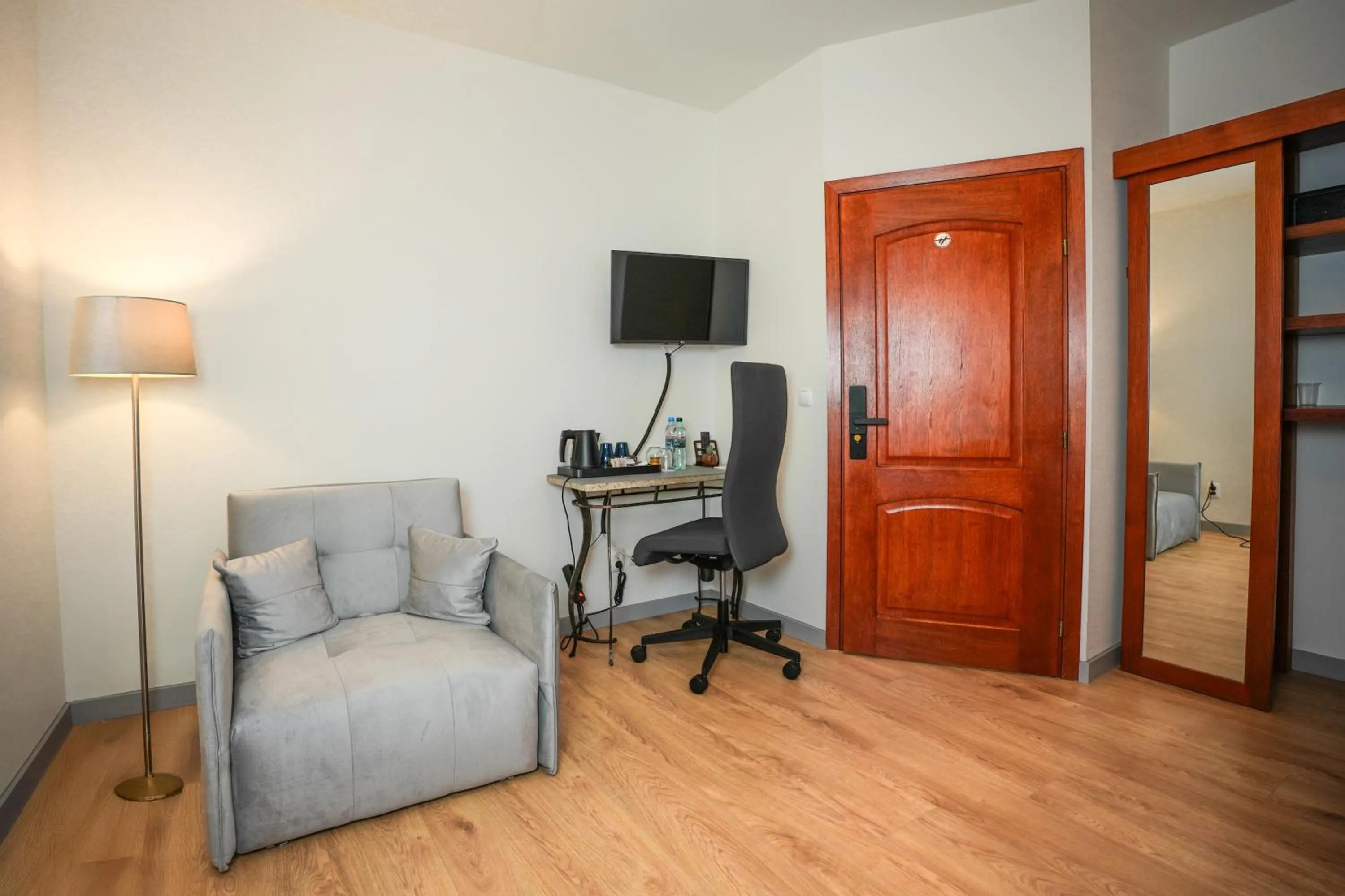 Communal lounge/ TV room in Villa Admiral