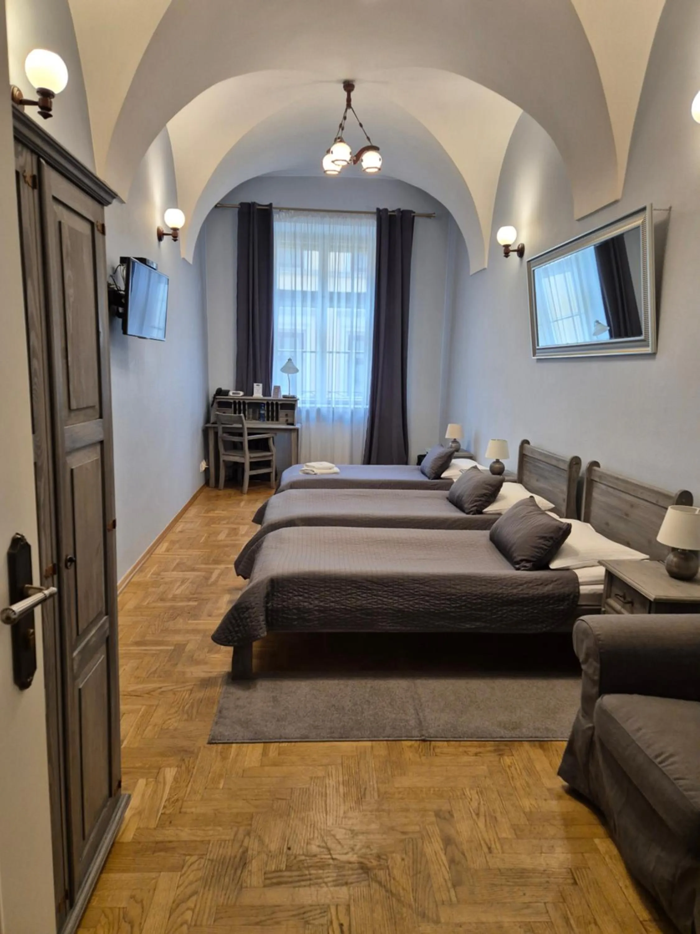 Bed in Hotel Mikołaj