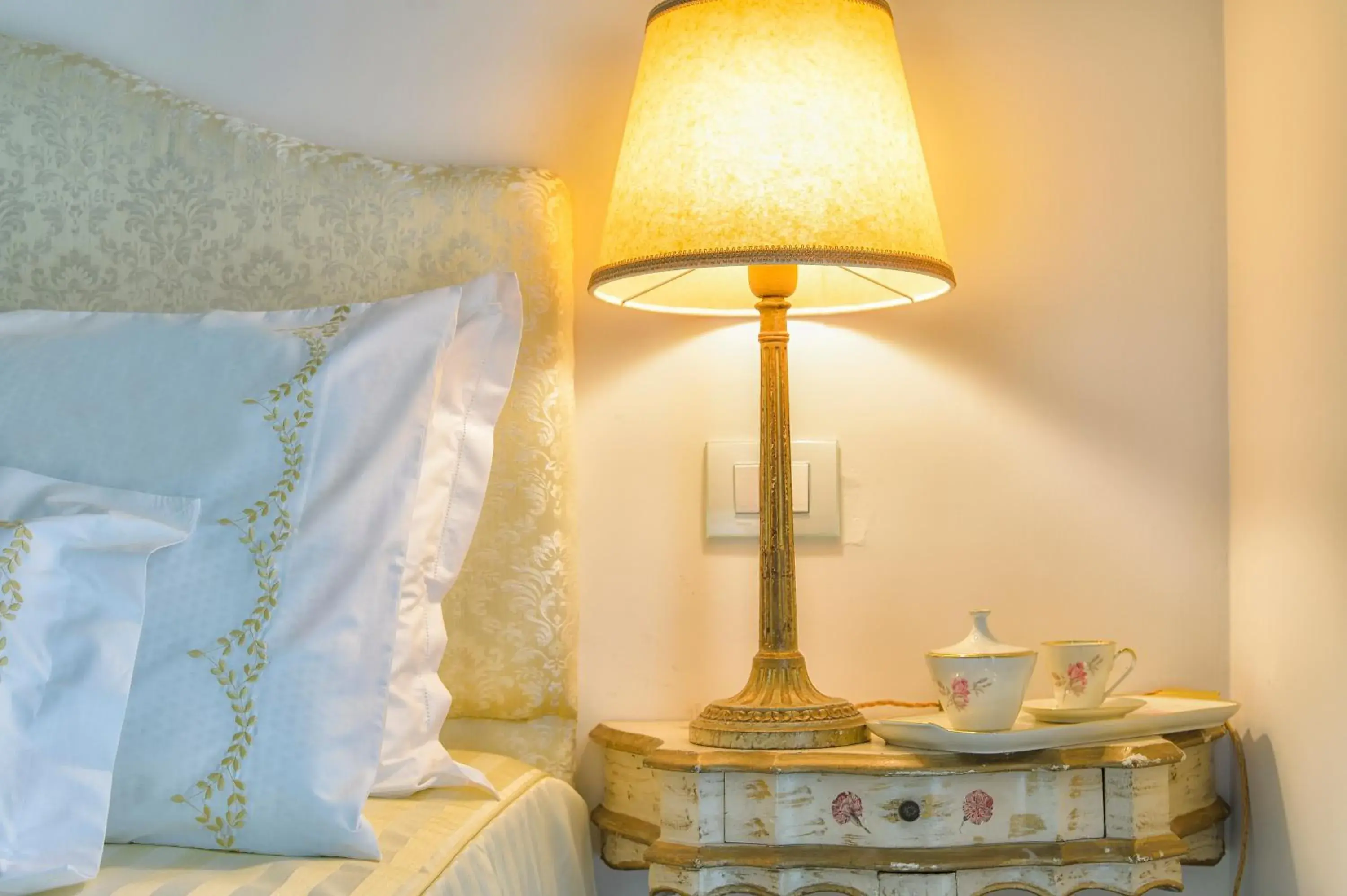 Decorative detail, Bed in Hotel Santa Marta Suites Decorative detail, Bed in Hotel Santa Marta Suites