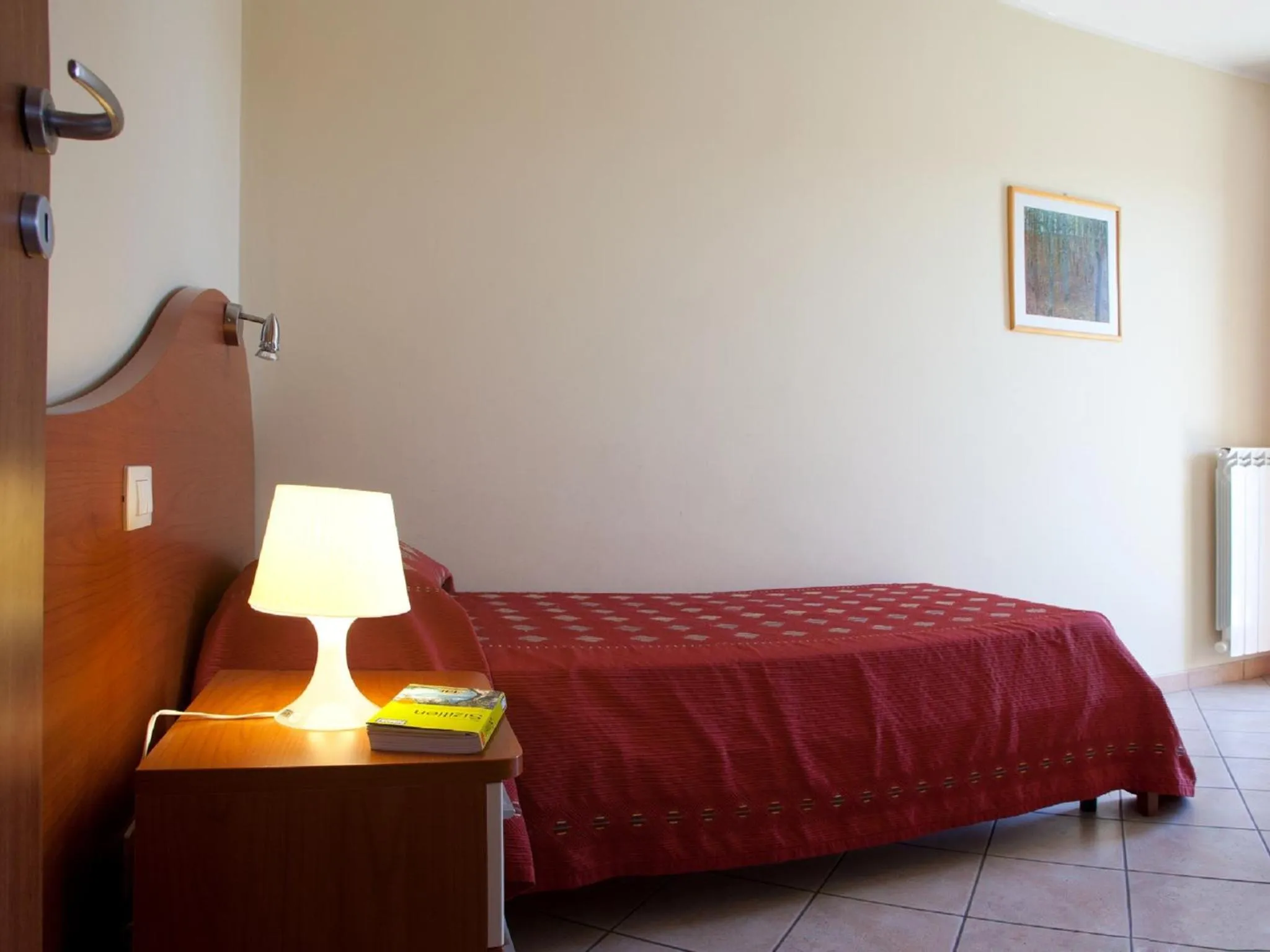 Bed in Motta Residence Hotel