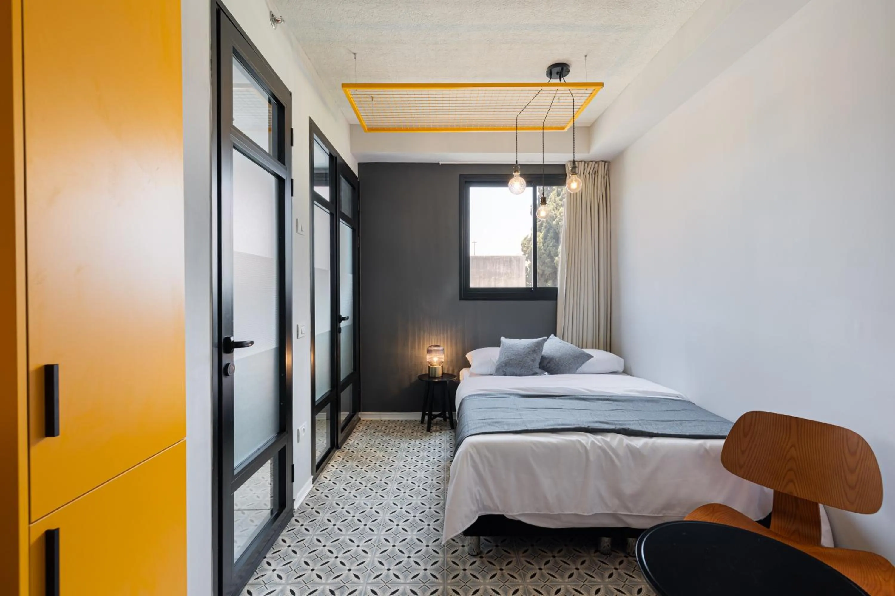 Photo of the whole room, Bed in Levinski Market Hotel