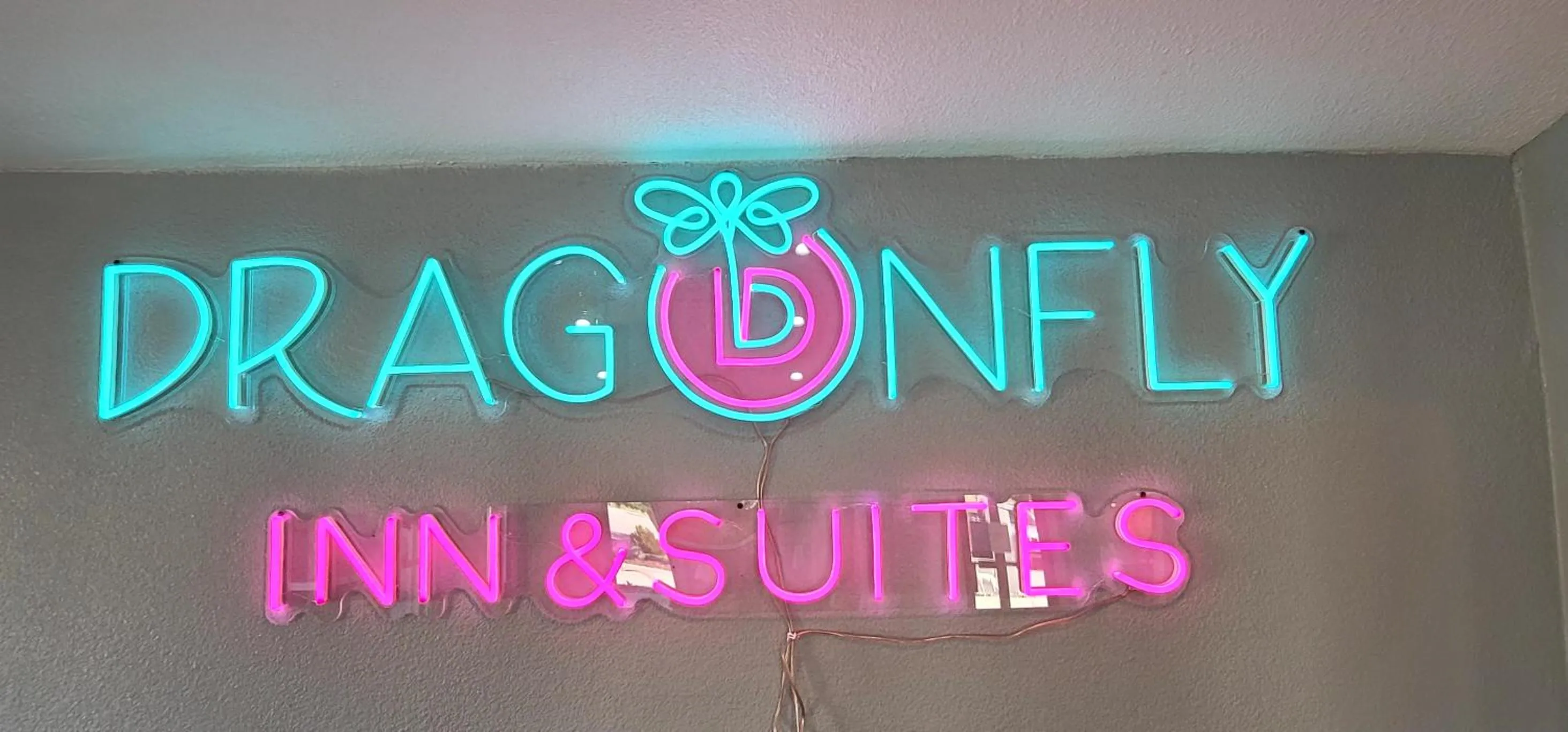 Property logo or sign in Dragonfly Inn & Suites