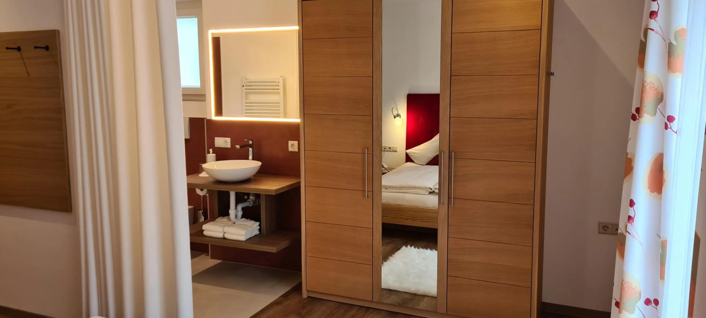 Bathroom, Bed in Appartements Dornach