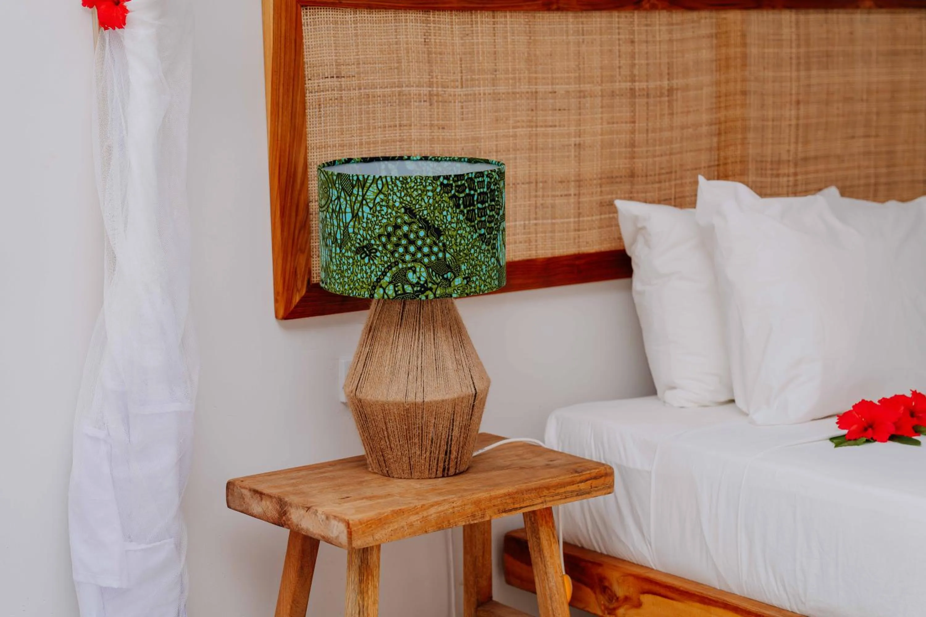 Bed in Spice Island Hotel & Resort