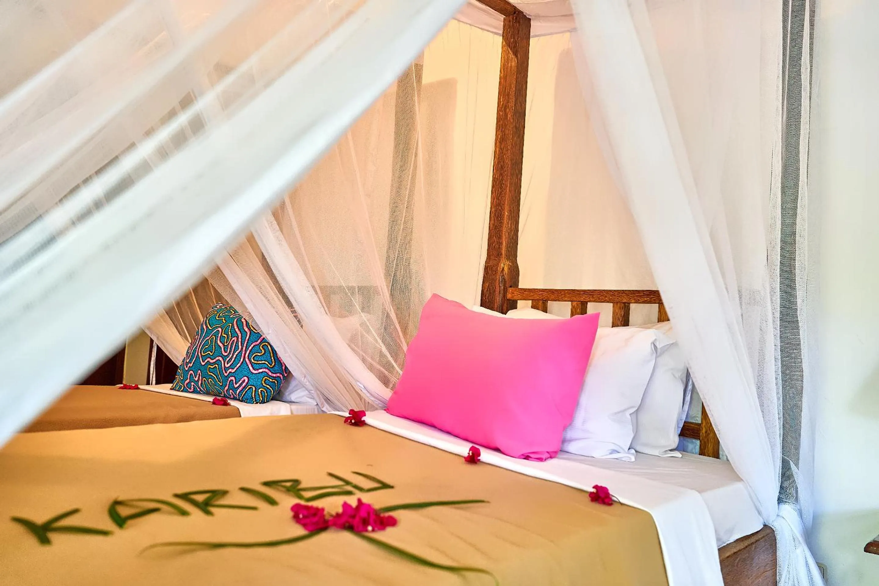 Bed in Spice Island Hotel & Resort
