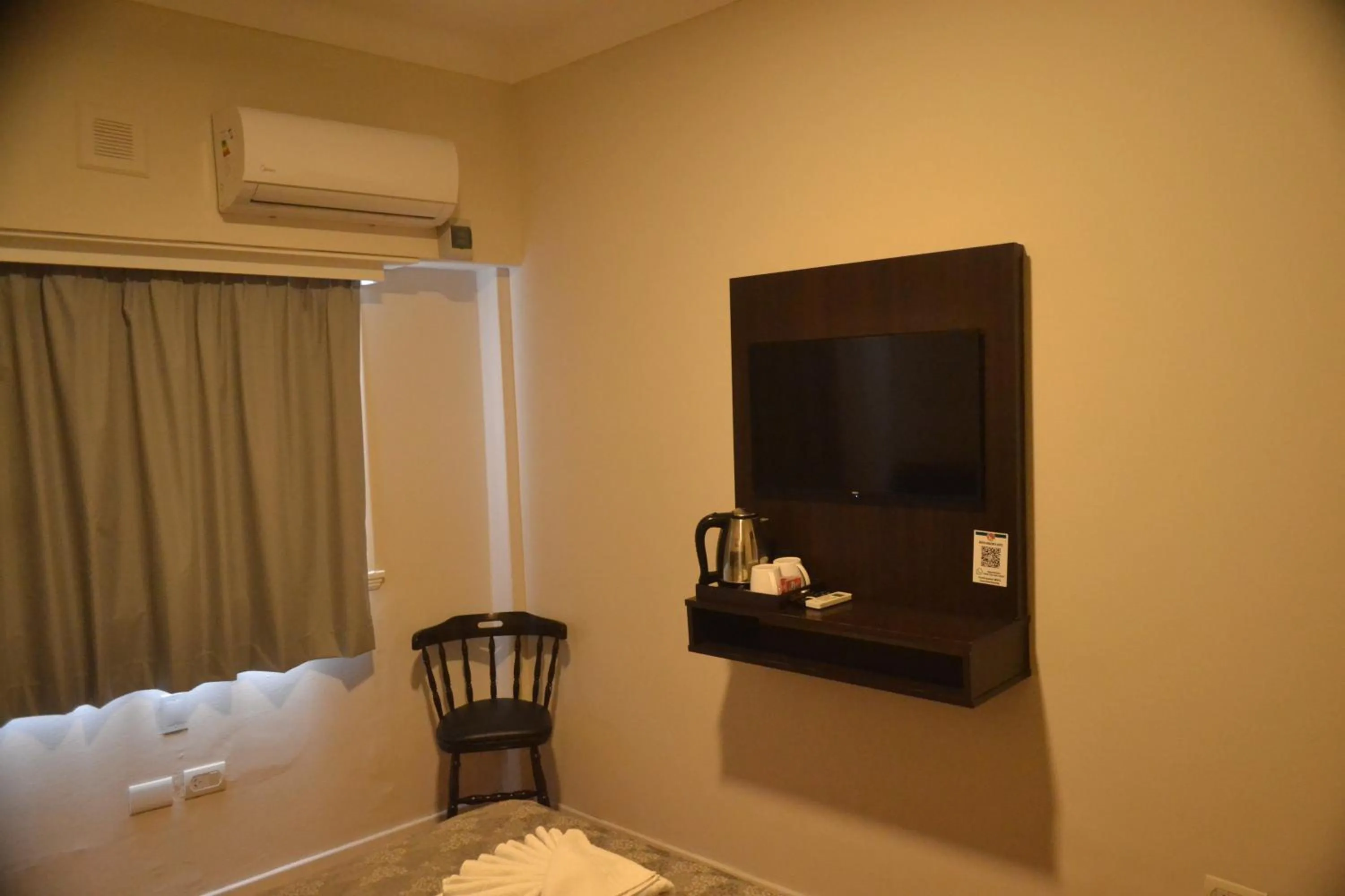 TV and multimedia, Bed in Nuevo Horizonte Hotel