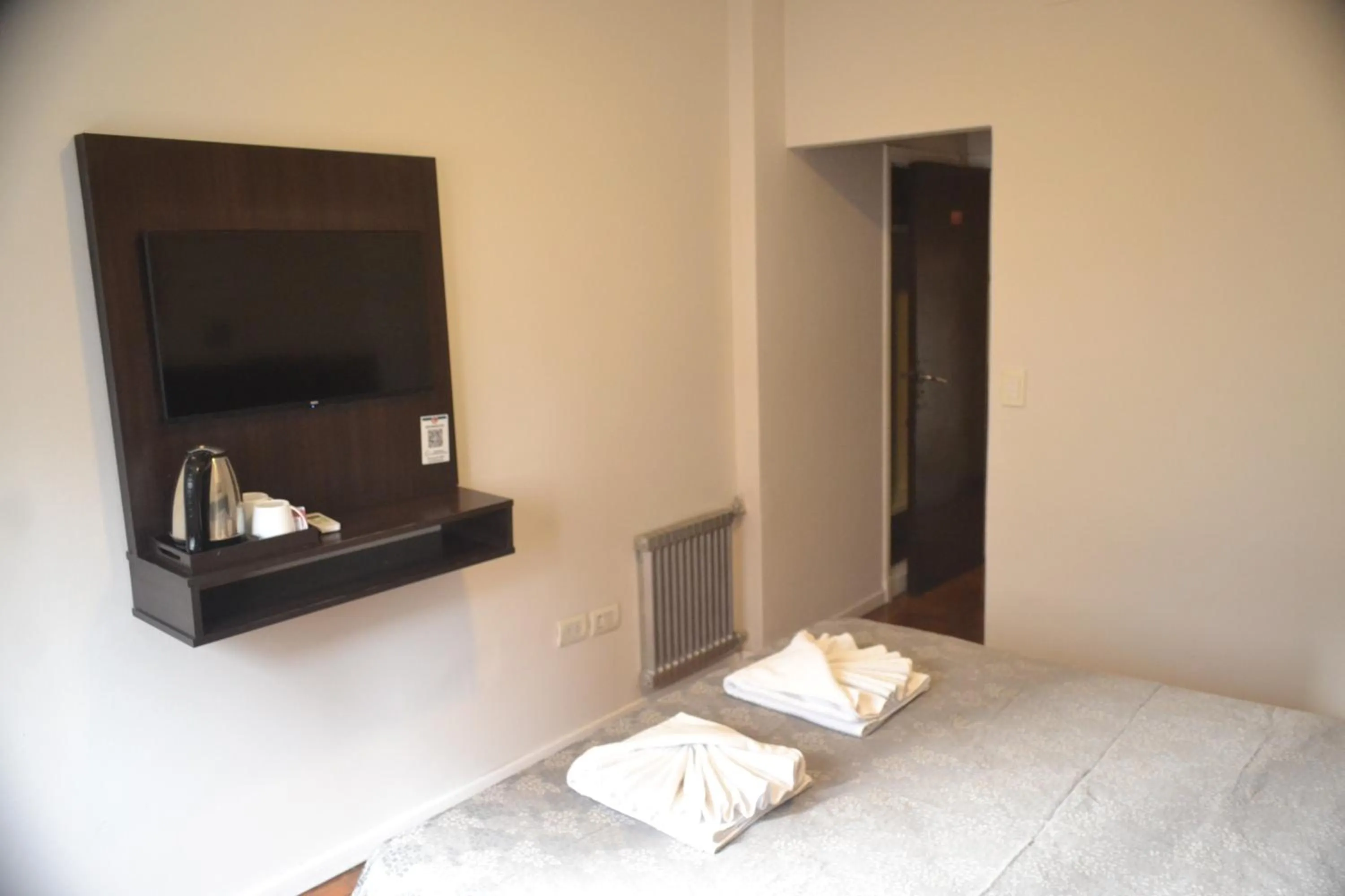 Photo of the whole room, Bed in Nuevo Horizonte Hotel