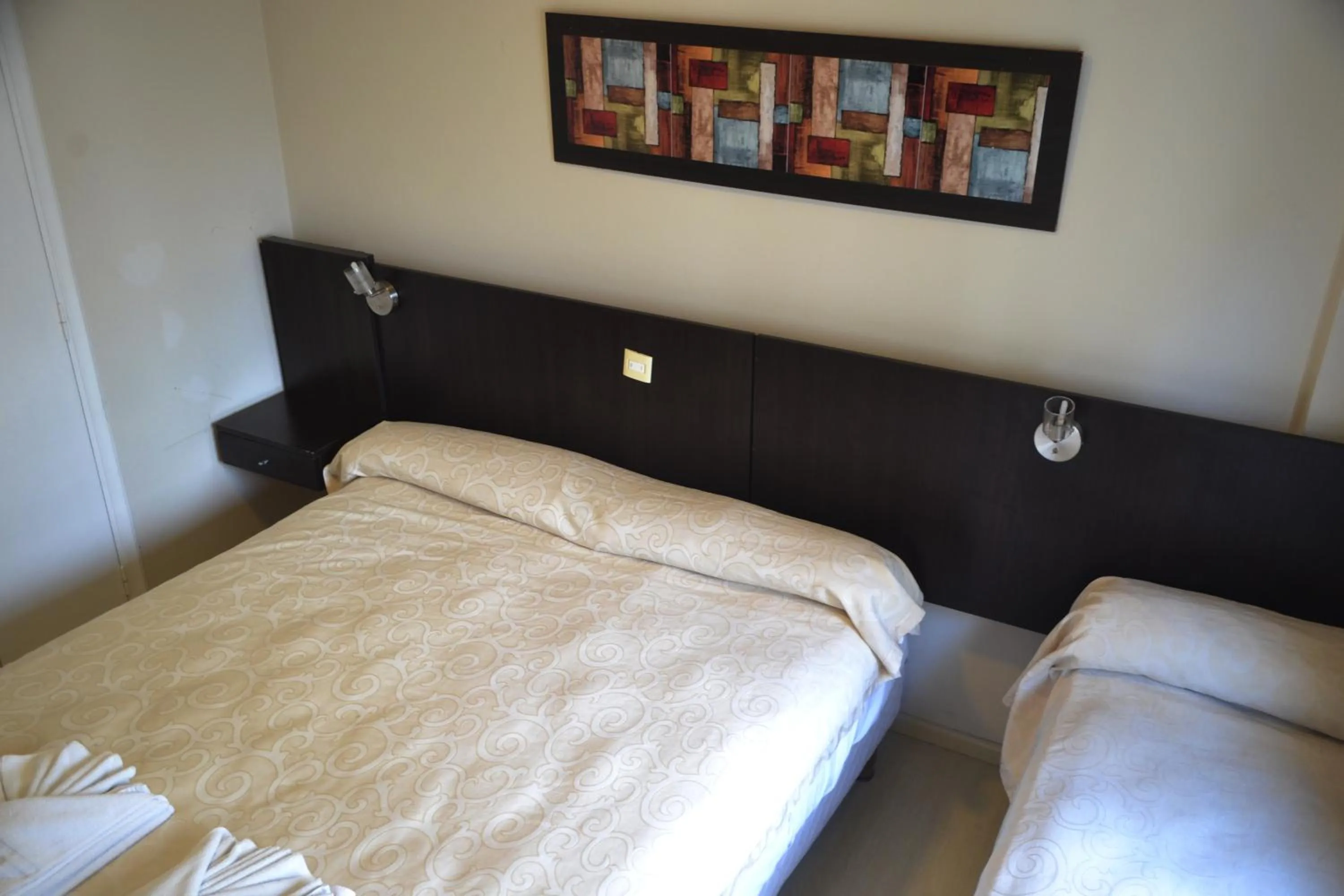 Photo of the whole room, Bed in Nuevo Horizonte Hotel