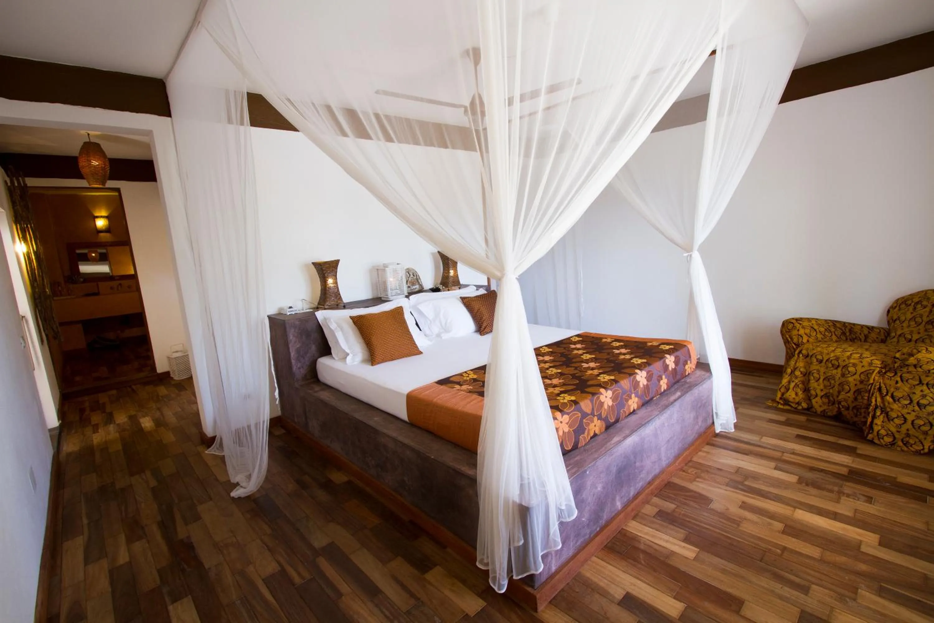 Bed in Uzuri Boutique Hotel