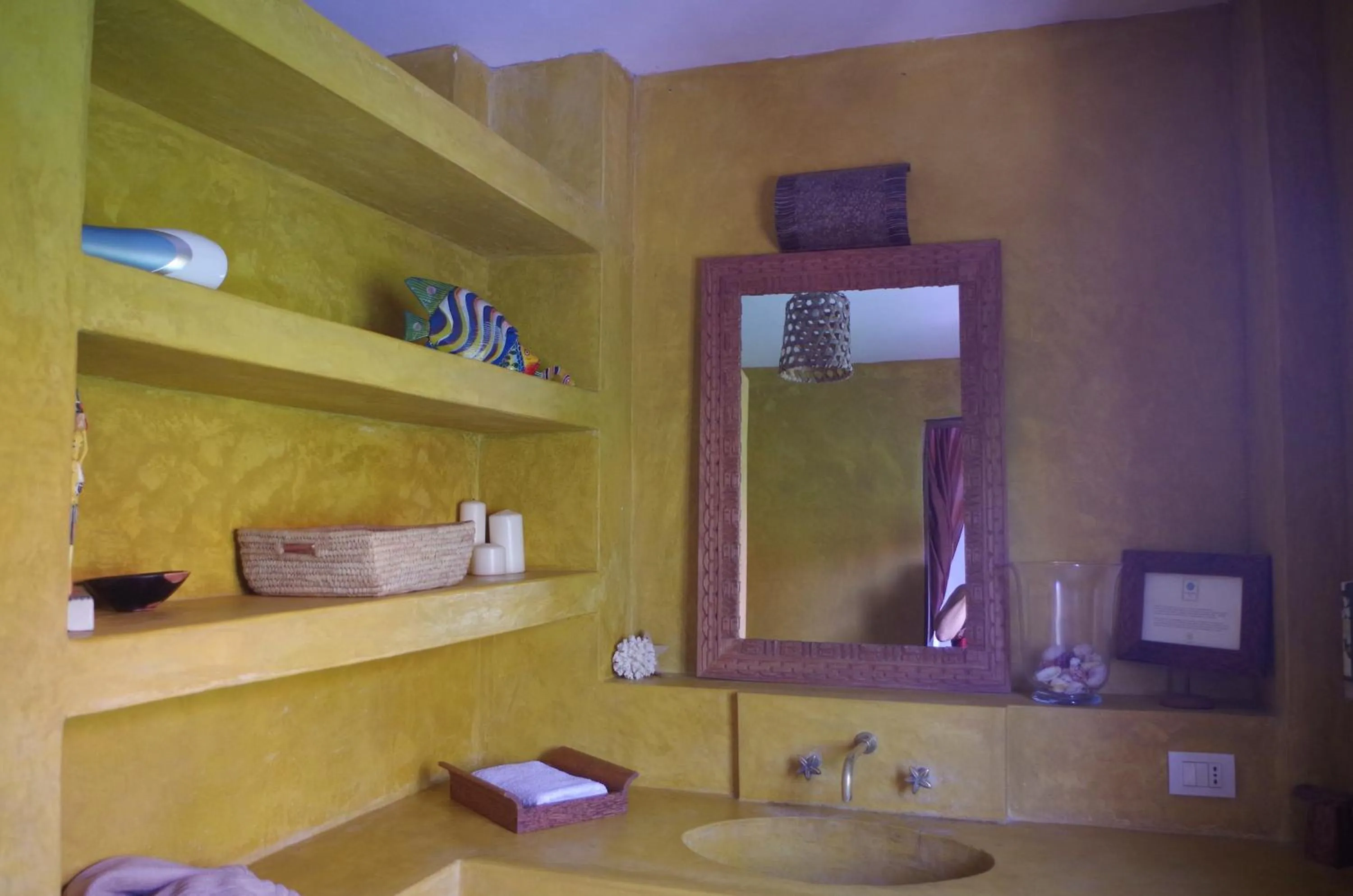 Bed in Uzuri Boutique Hotel