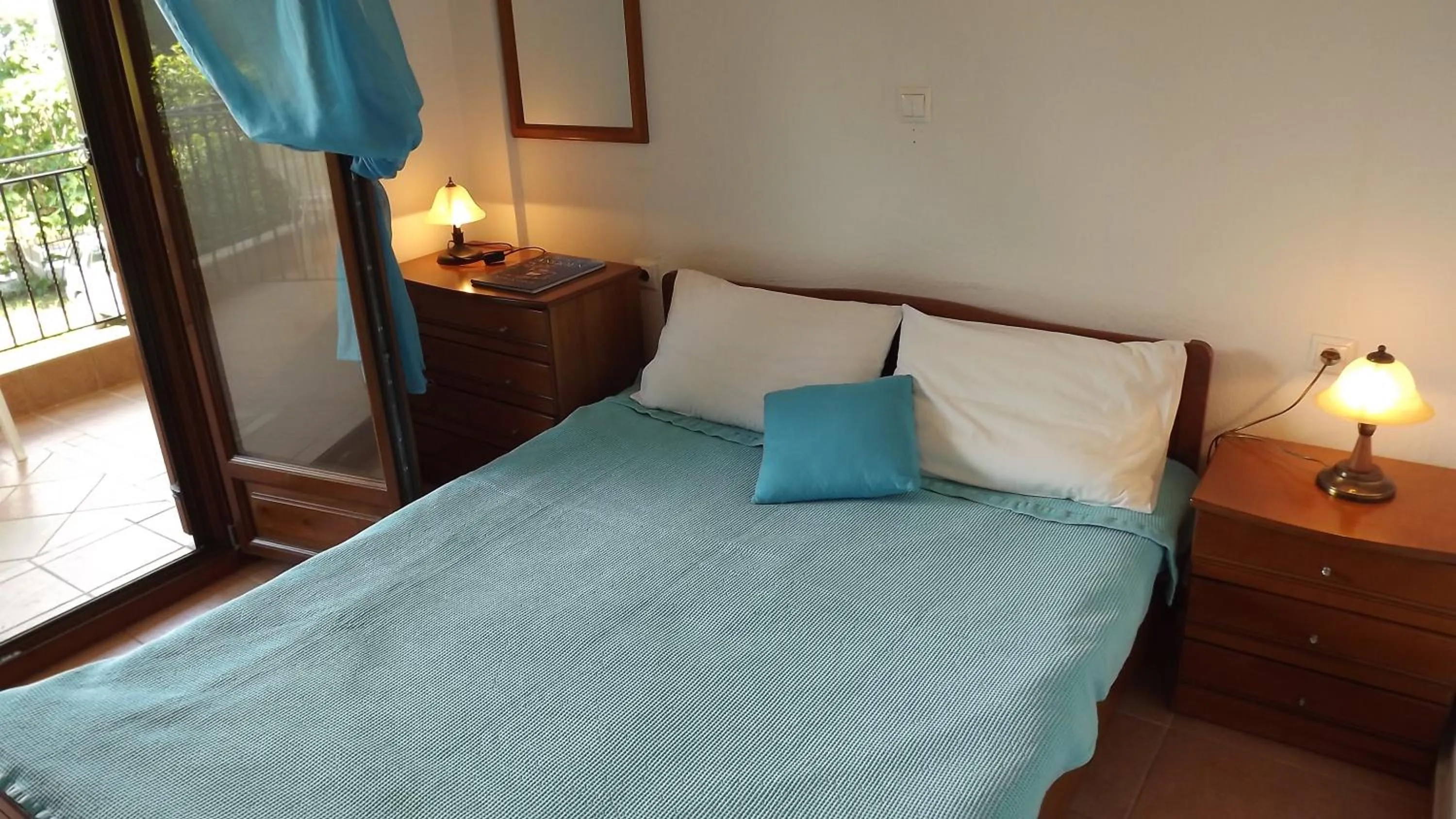 Bed in Pefka Studios & Apartments