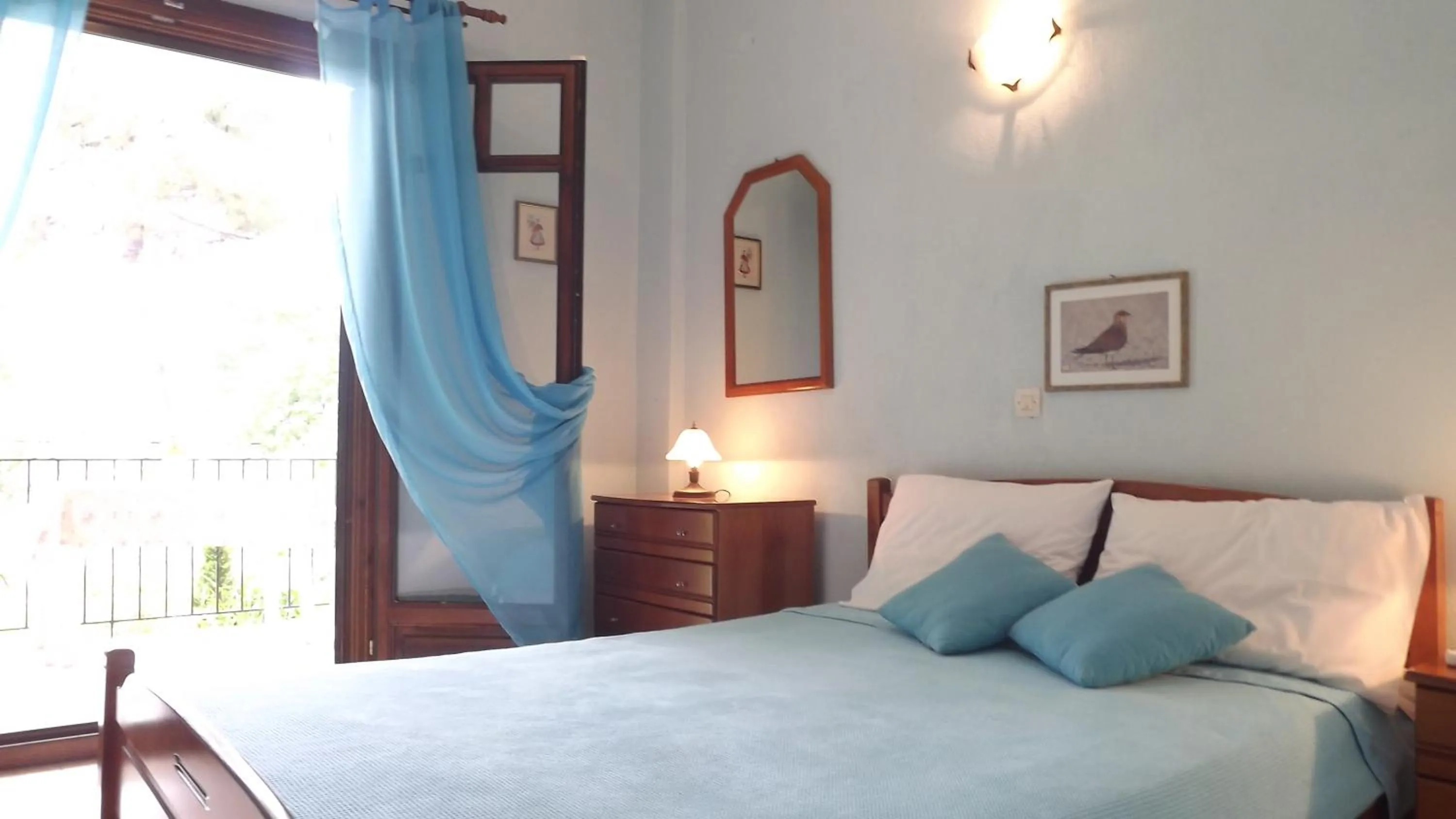 Bed in Pefka Studios & Apartments