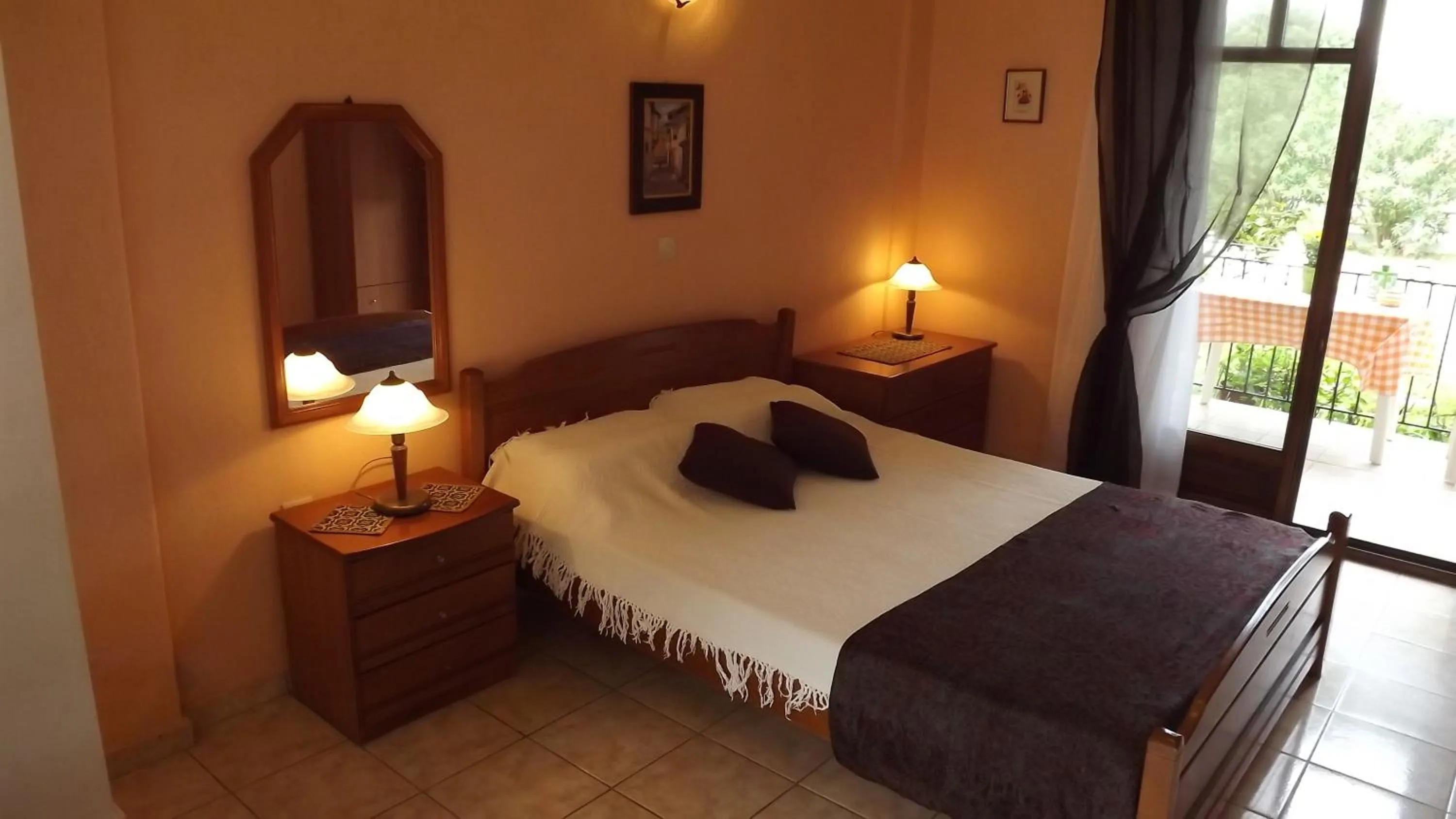 Bed in Pefka Studios & Apartments