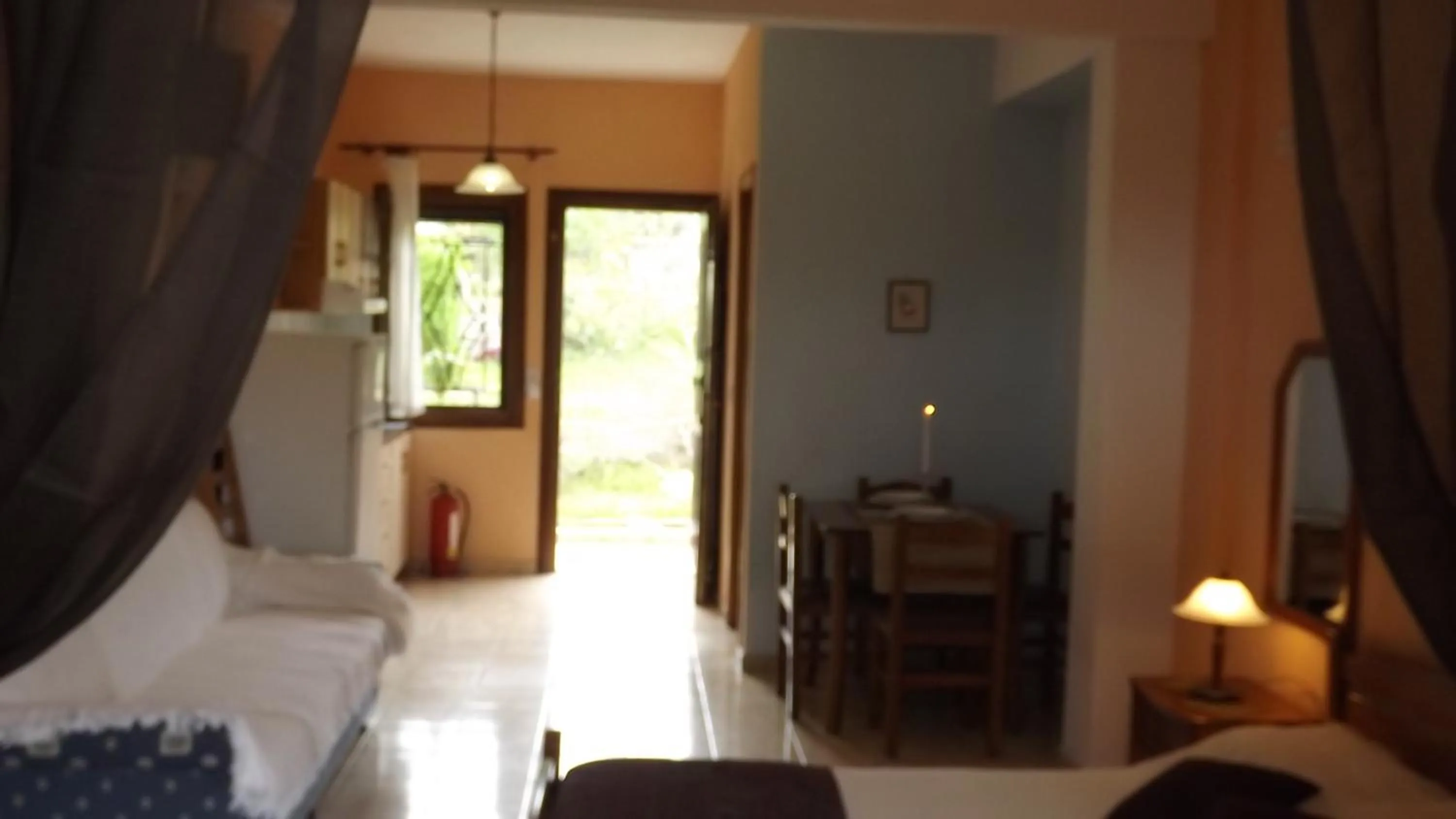 Seating area, Bed in Pefka Studios & Apartments