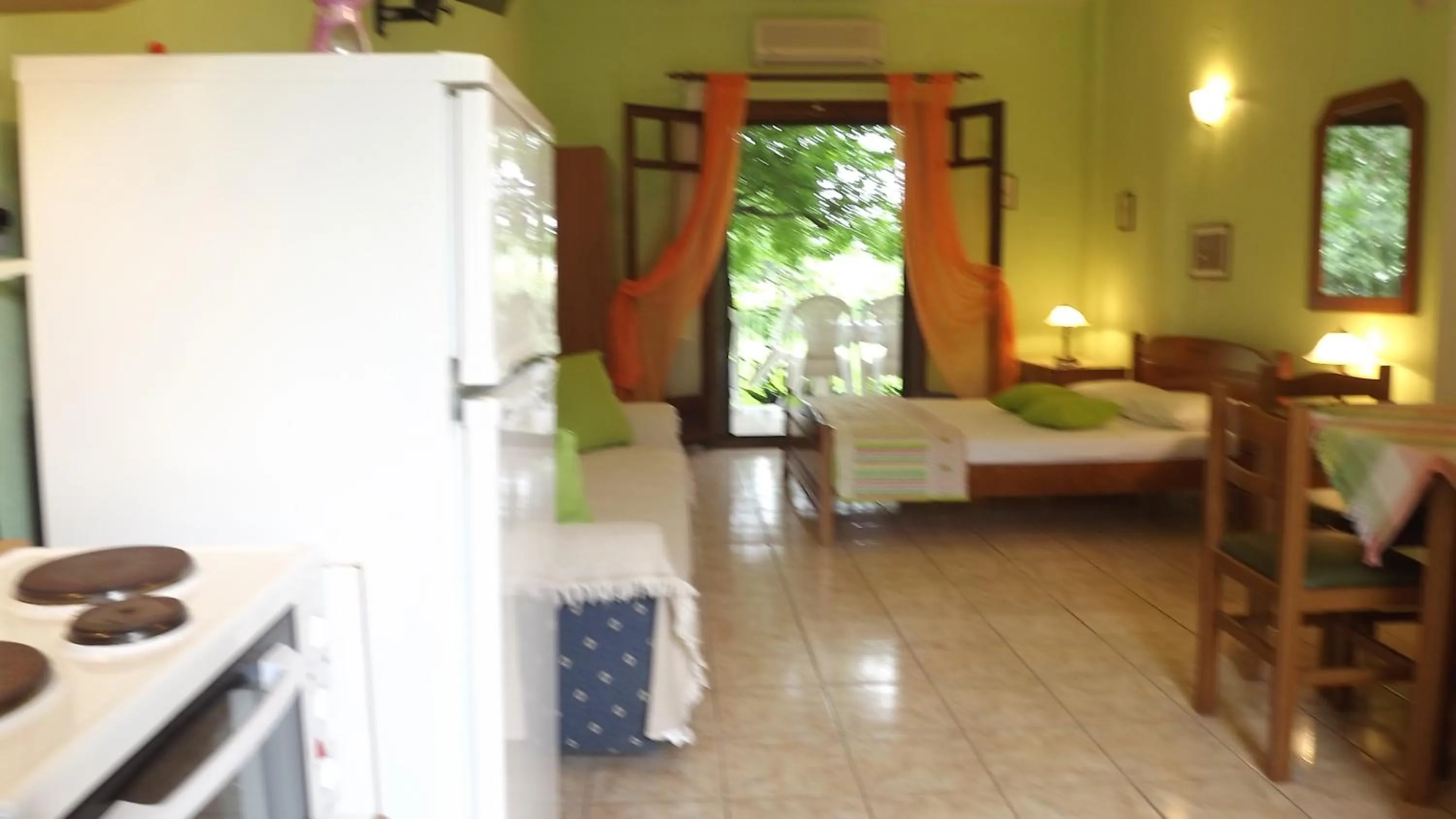 Bed in Pefka Studios & Apartments