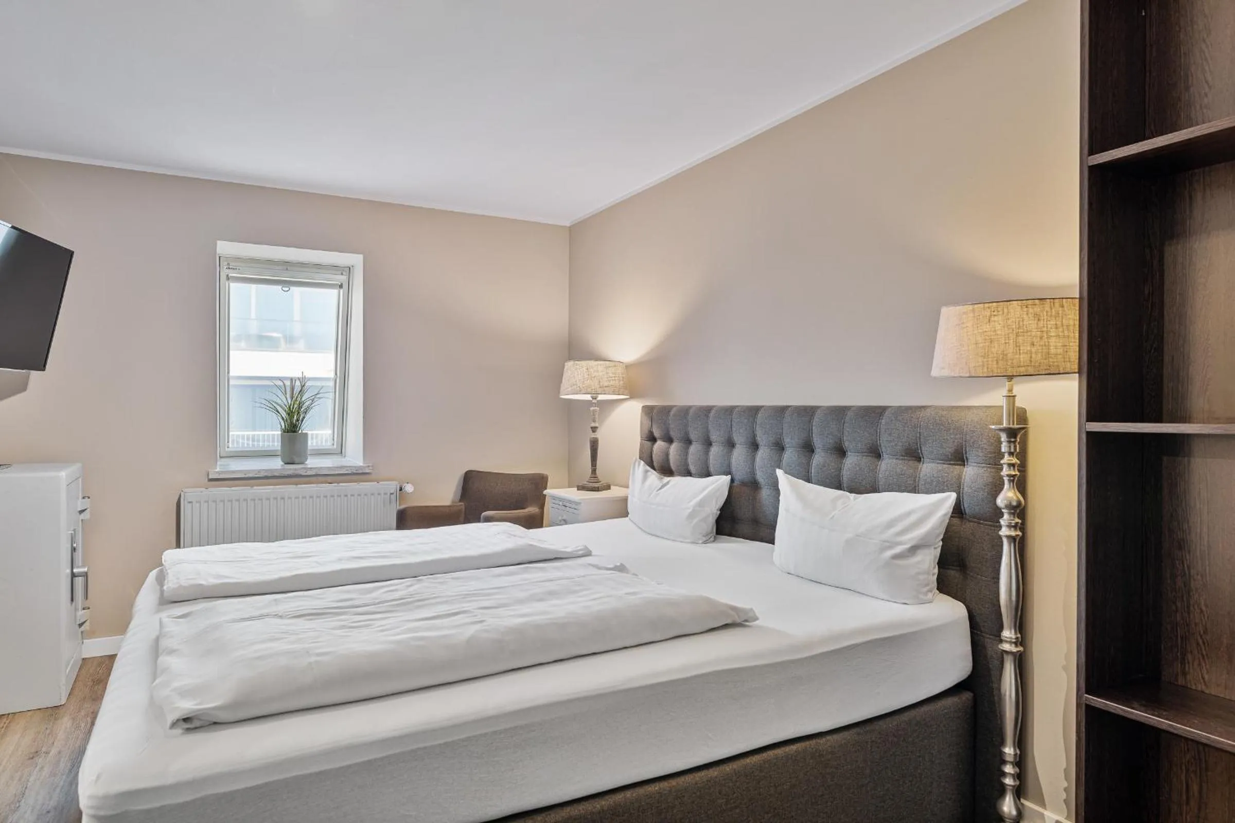 Photo of the whole room, Bed in Hotel Strand No.1