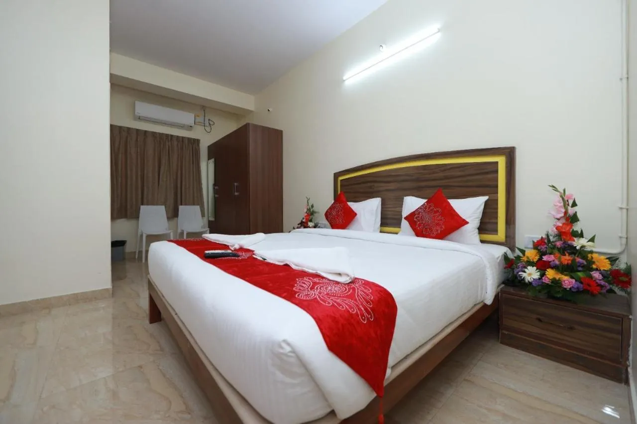 Bed in Hotel Amulya Relax Inn