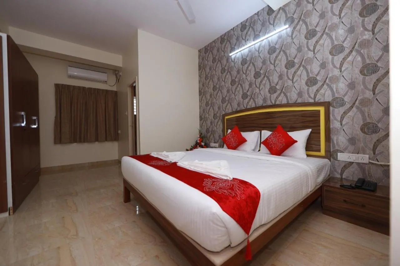 Bed in Hotel Amulya Relax Inn