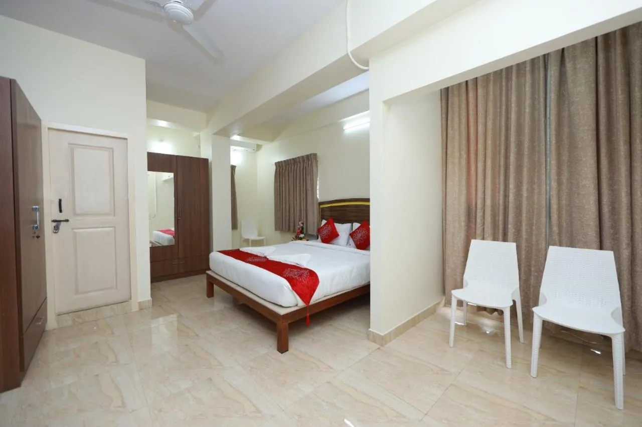 Bed in Hotel Amulya Relax Inn
