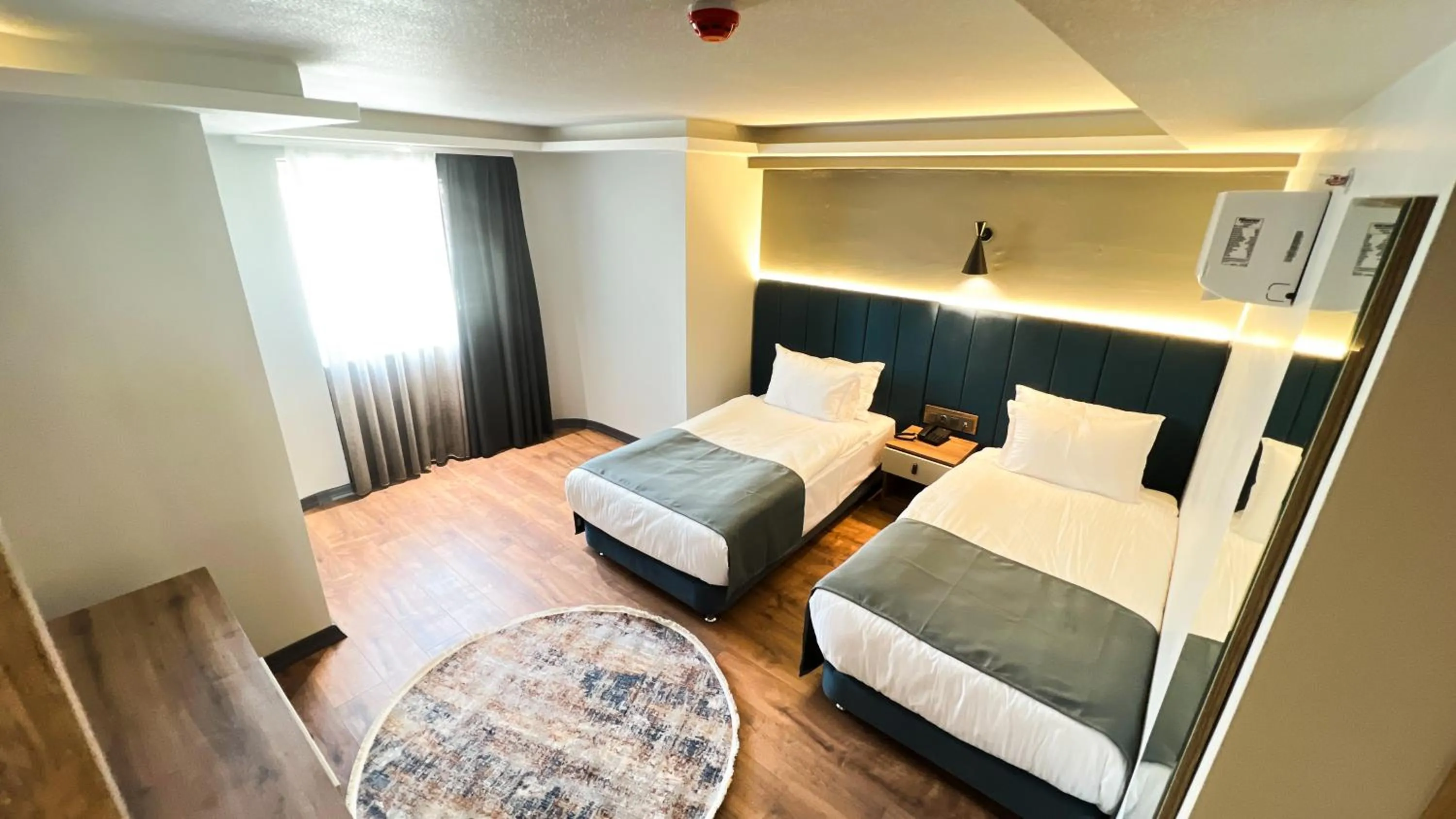 Bed in Nira Boutique Hotel