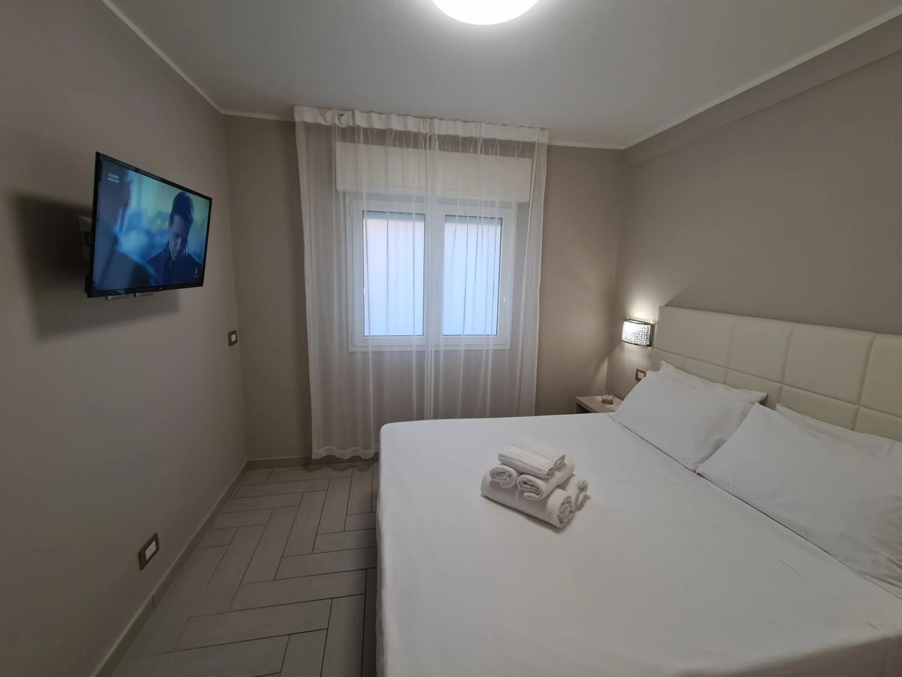 Bed in Nero D'Avorio Apartments