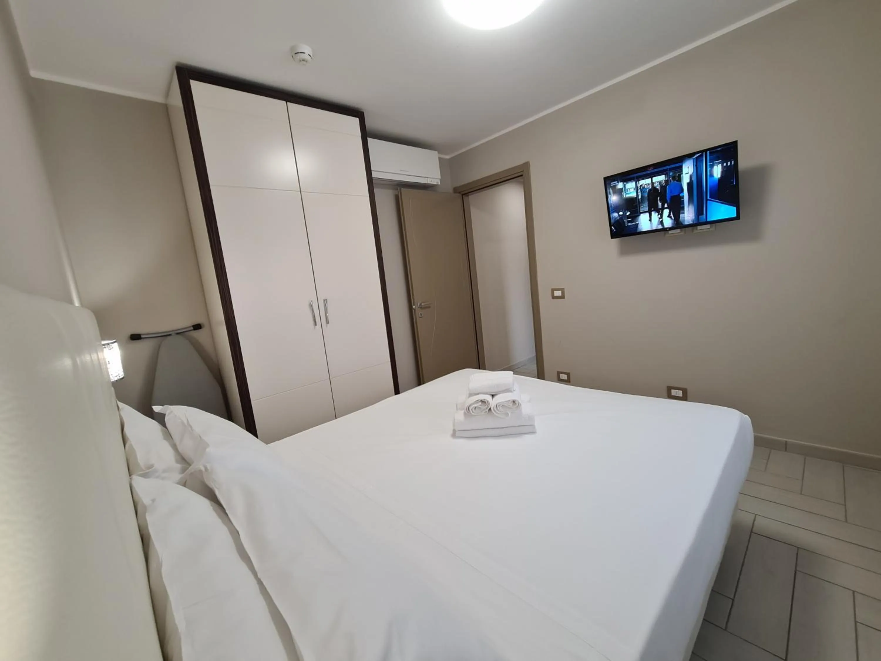 Bed in Nero D'Avorio Apartments