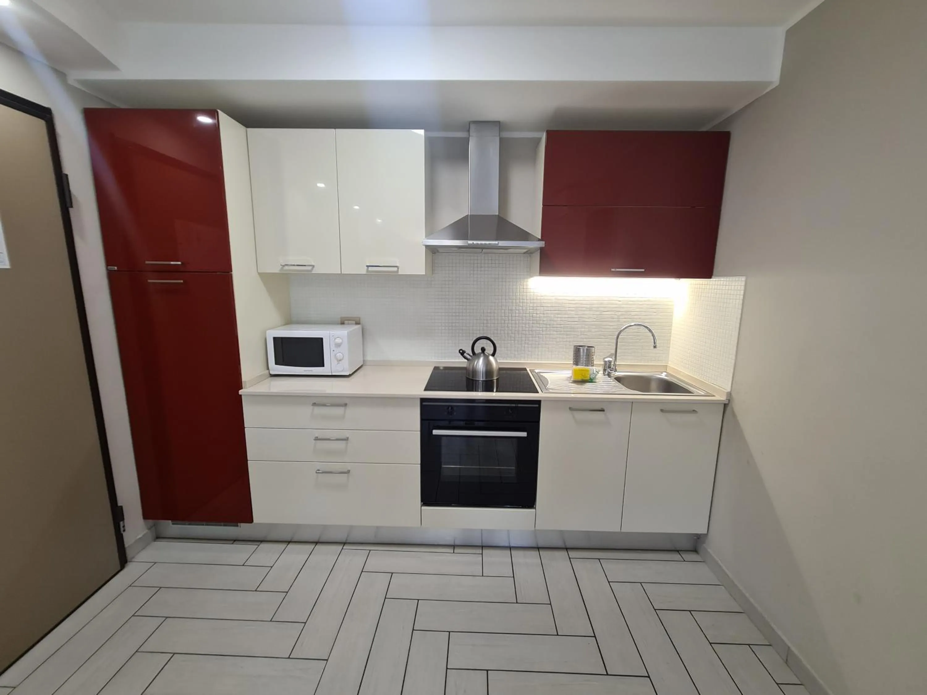 Kitchen or kitchenette in Nero D'Avorio Apartments
