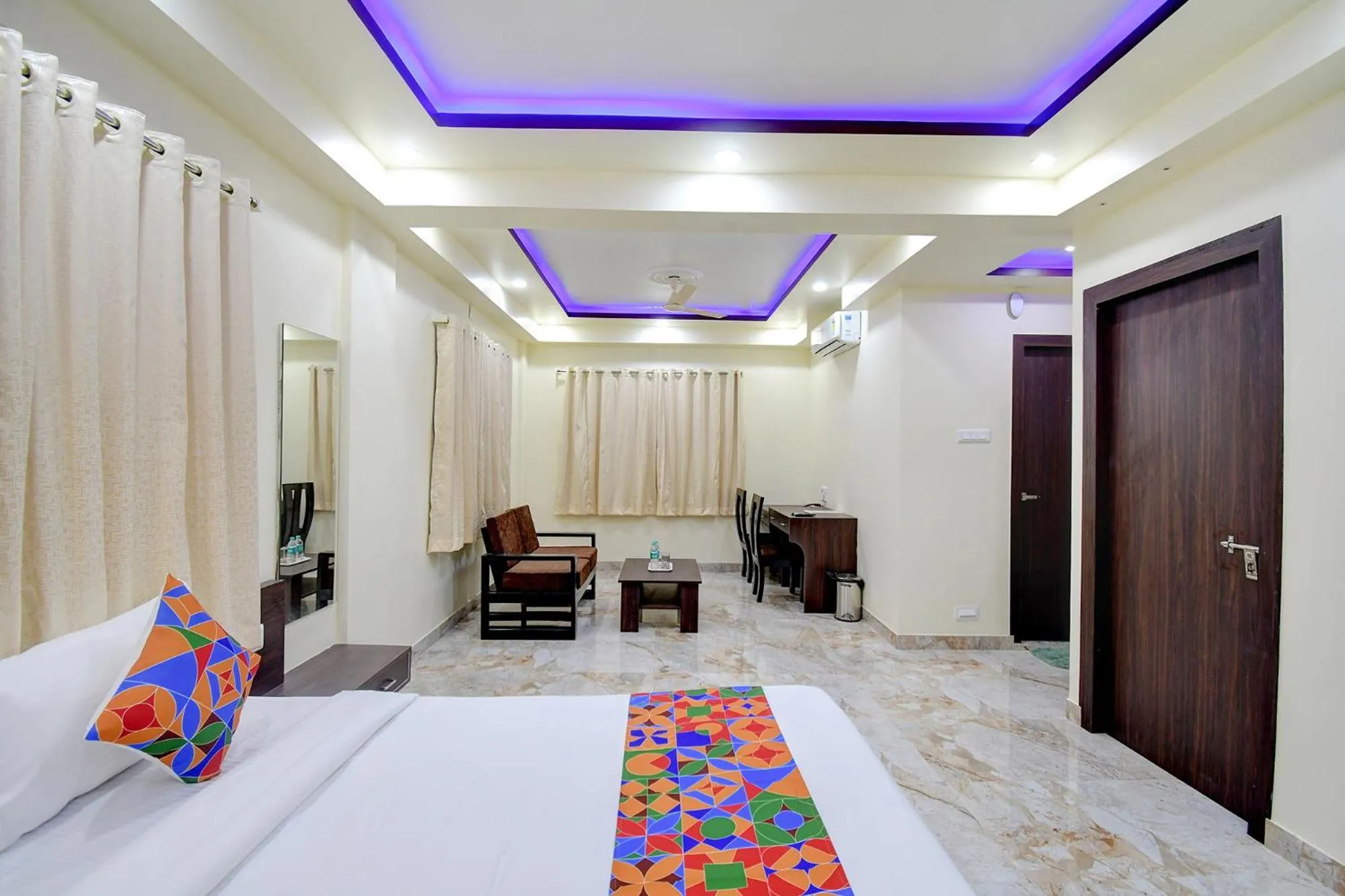 Bed in FabHotel Anchorage Inn - Nr Axis Mall