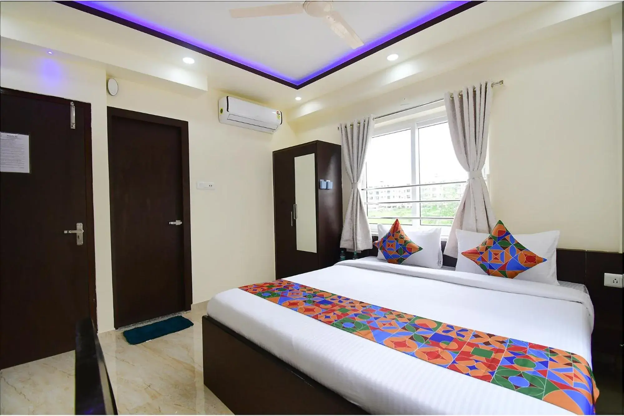 Bedroom, Bed in FabHotel Anchorage Inn - Nr Axis Mall Bedroom, Bed in FabHotel Anchorage Inn - Nr Axis Mall