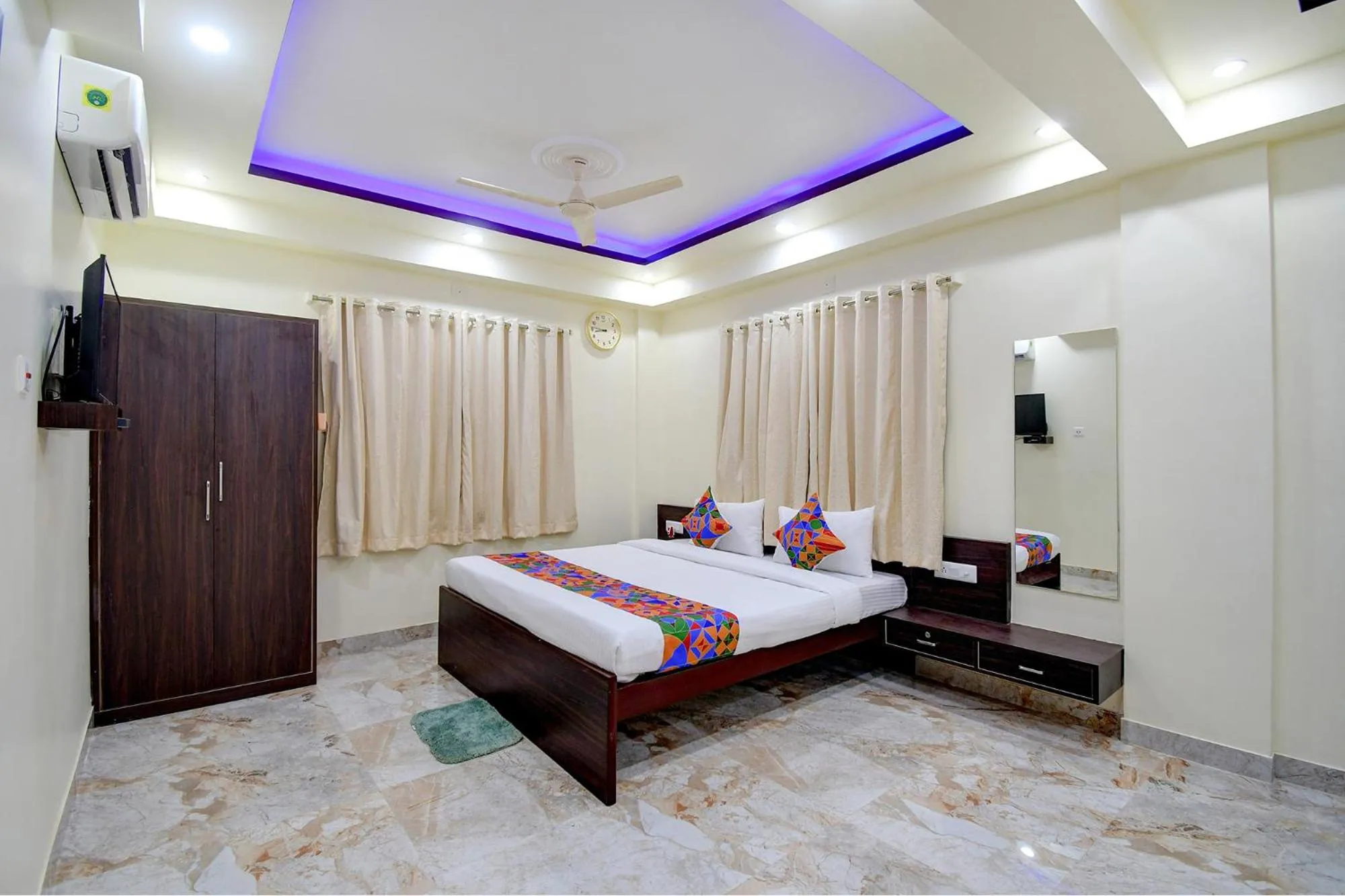 Bed in FabHotel Anchorage Inn - Nr Axis Mall