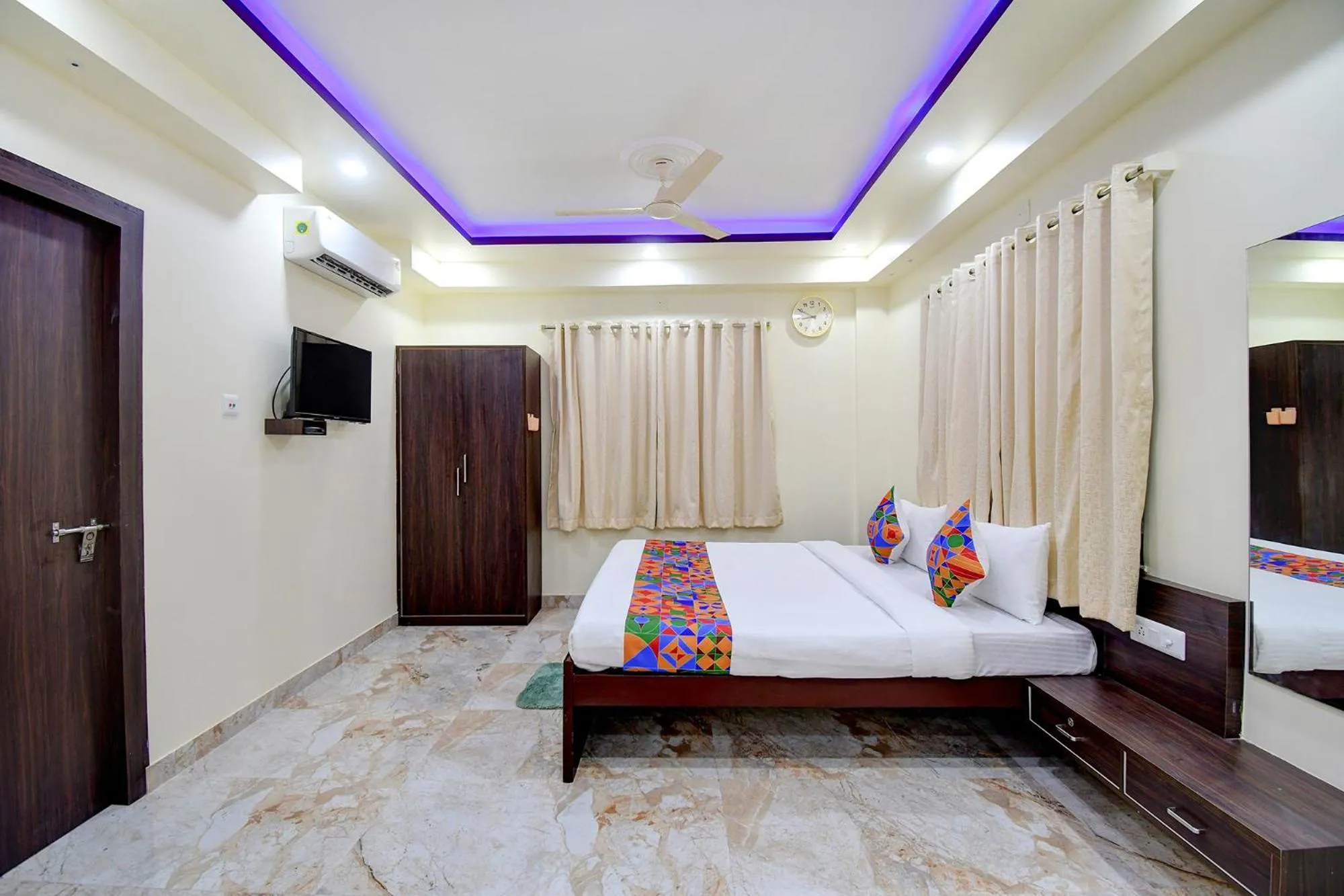 Bed in FabHotel Anchorage Inn - Nr Axis Mall