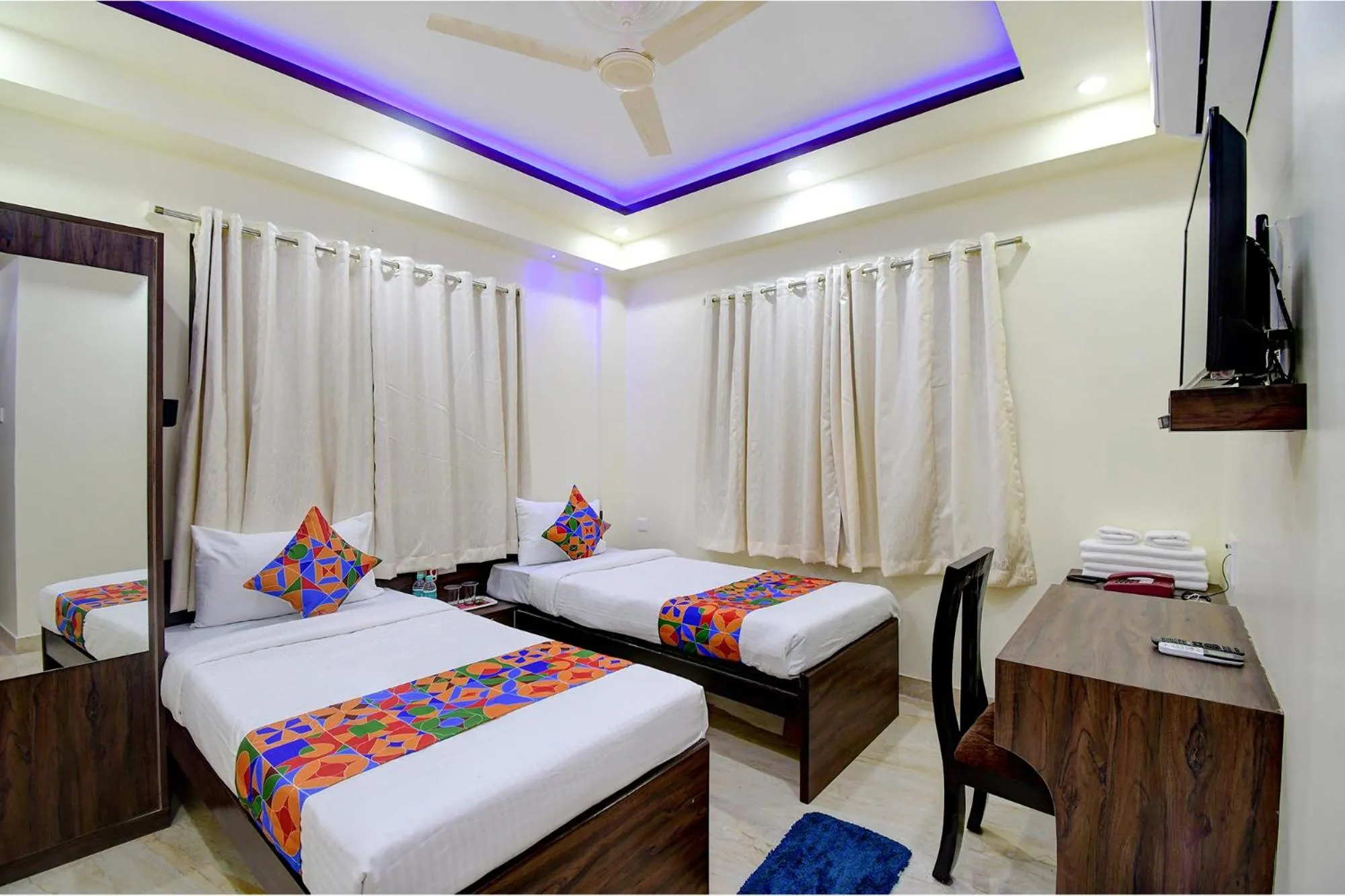 Bed in FabHotel Anchorage Inn - Nr Axis Mall